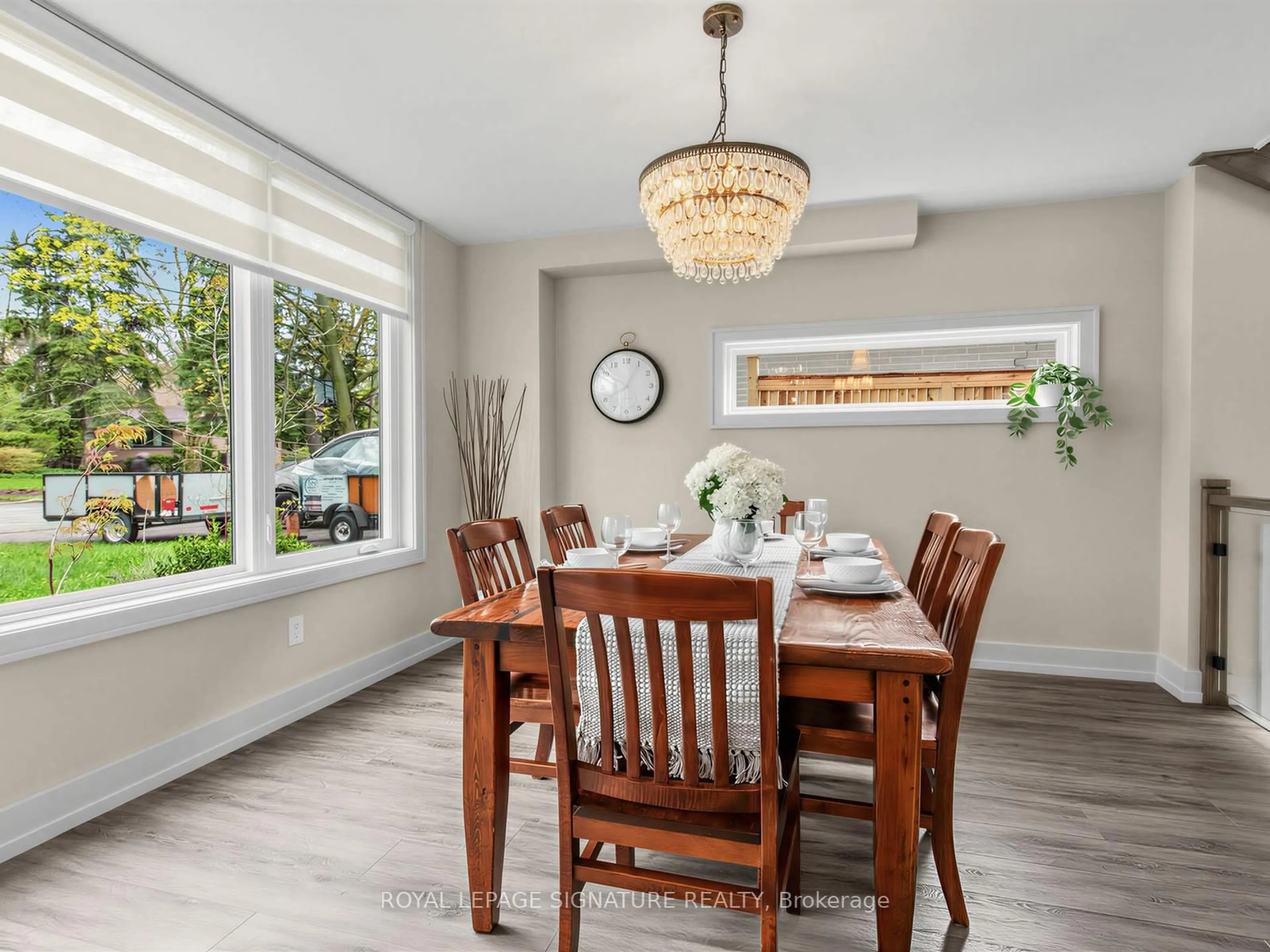 Dining room, wood/laminate floor for 81 Cottonwood Dr, Toronto Ontario M3C 2B3