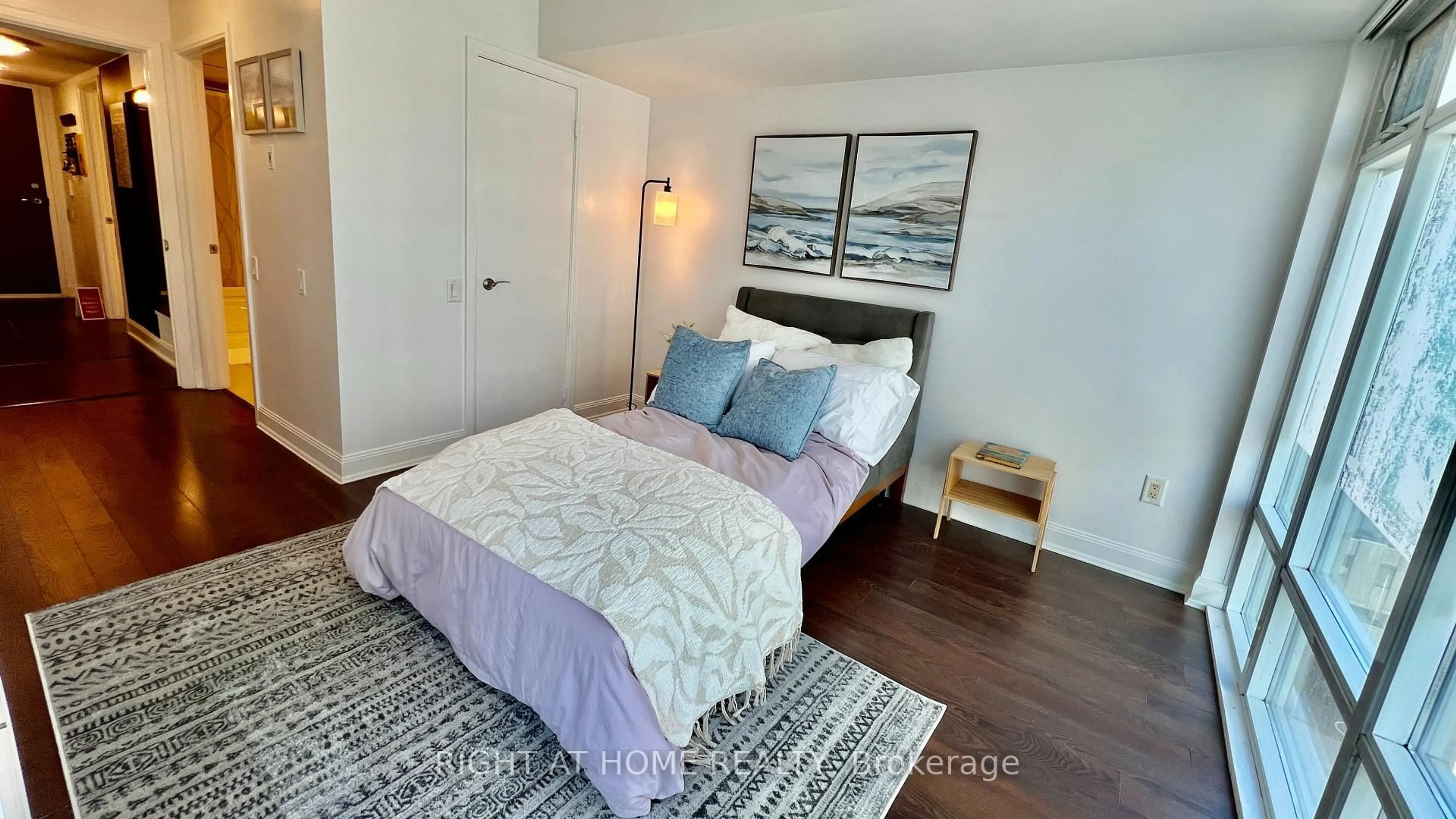 Bedroom with bed, wood/laminate floor for 2181 Yonge St #1011, Toronto Ontario M4S 3H7