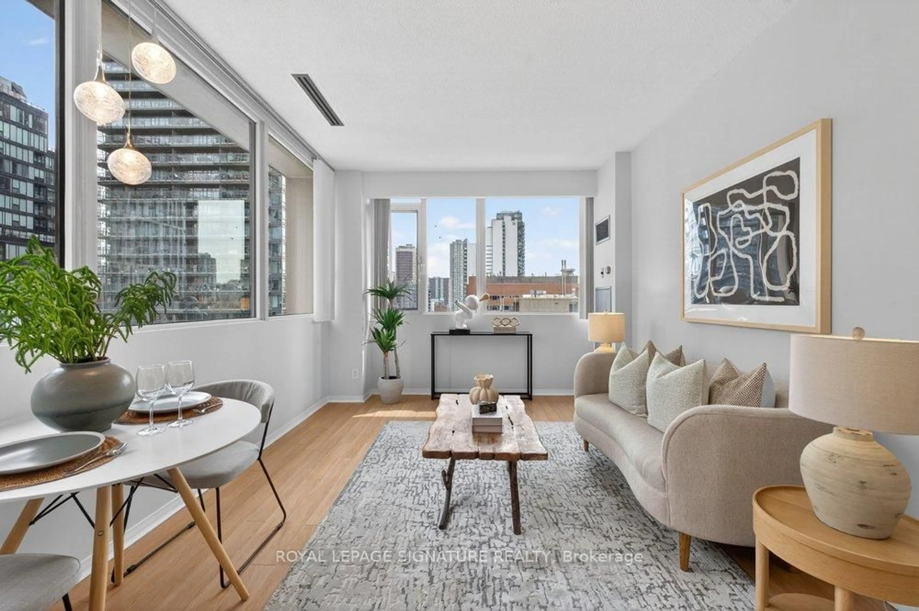 Living room with furniture, unknown for 555 Yonge St #707, Toronto Ontario M4Y 3A6