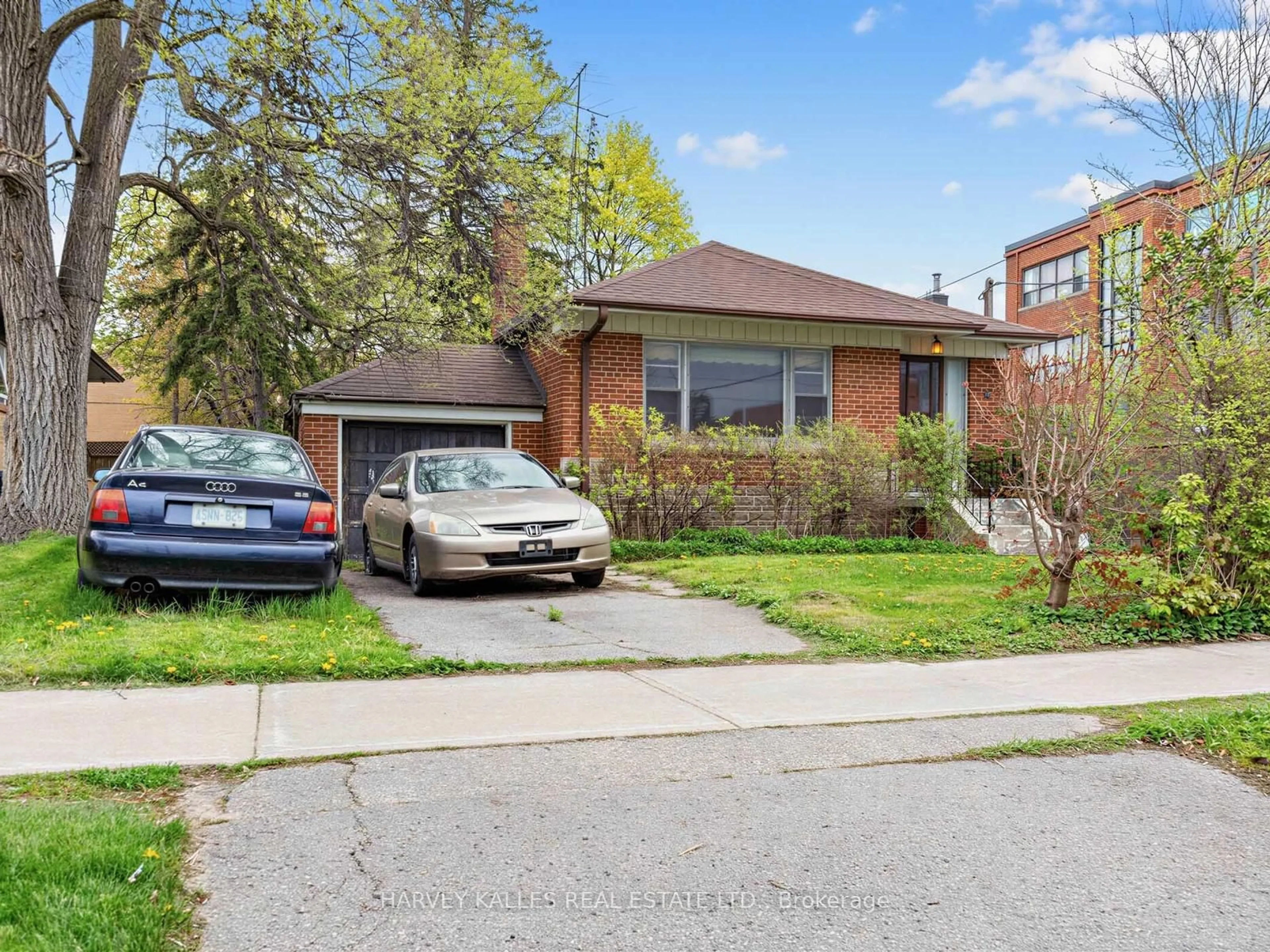 Home with brick exterior material, street for 12 Invermay Ave, Toronto Ontario M3H 1Z2