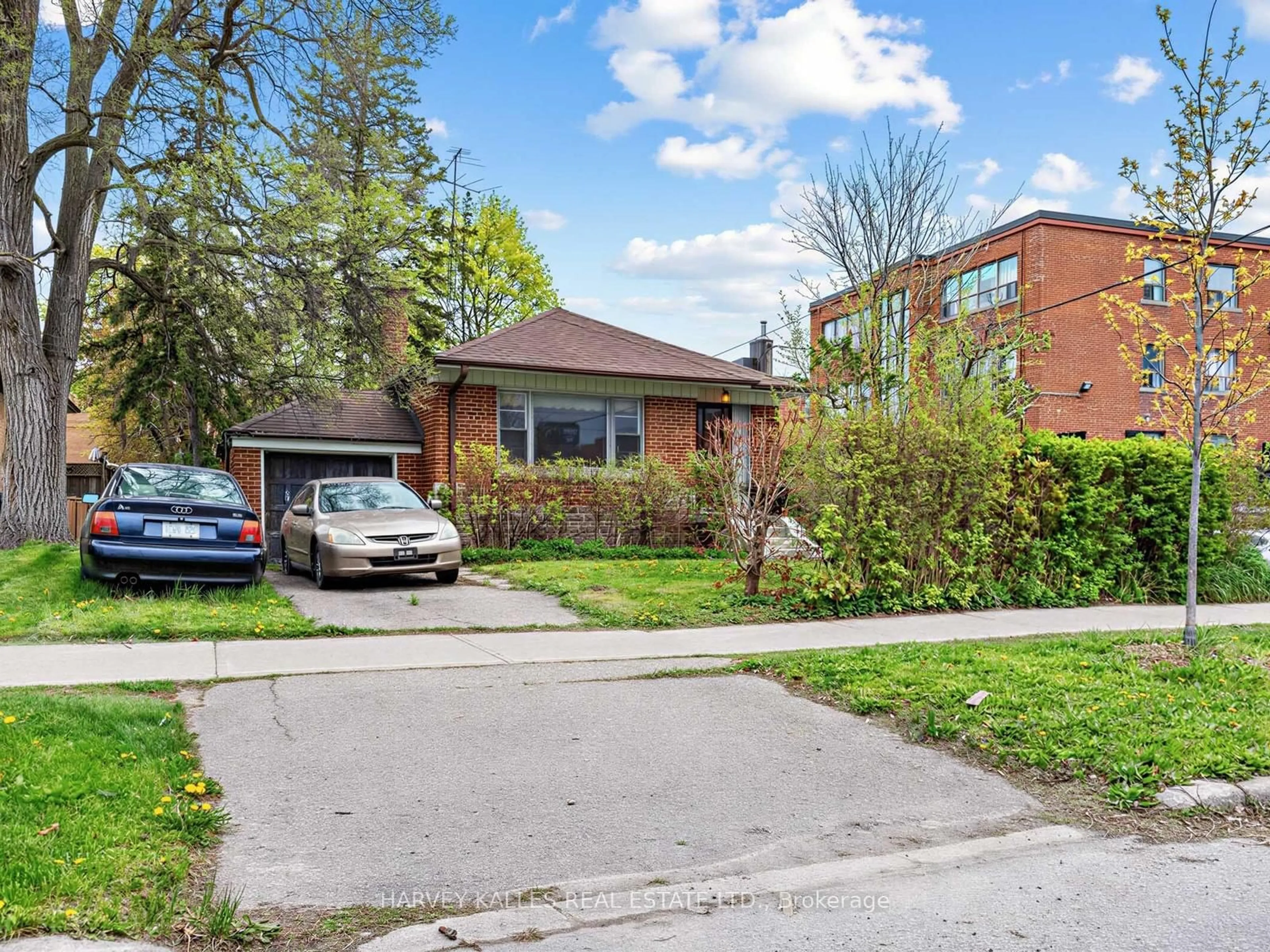 Home with brick exterior material, street for 12 Invermay Ave, Toronto Ontario M3H 1Z2
