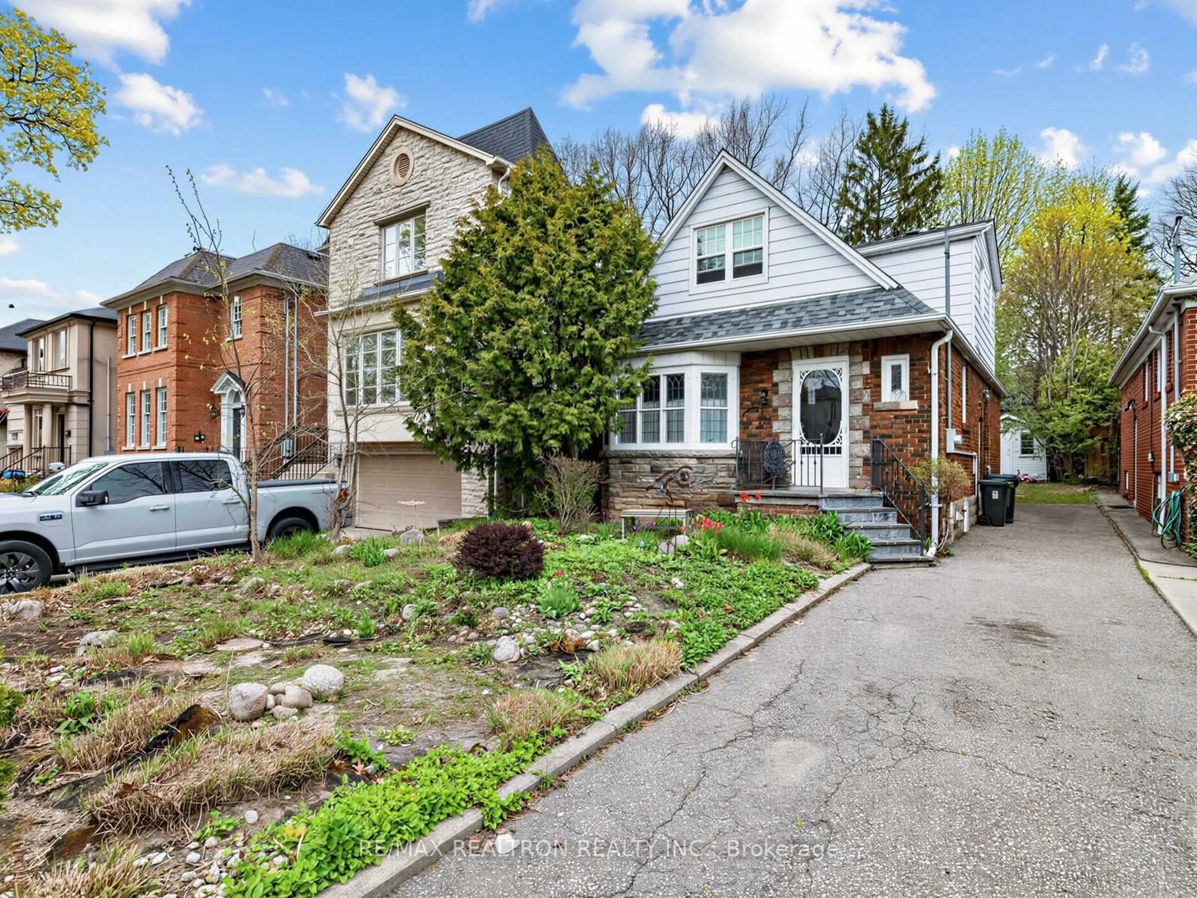 Home with brick exterior material, street for 12 New Haven Dr, Toronto Ontario M5N 1H7