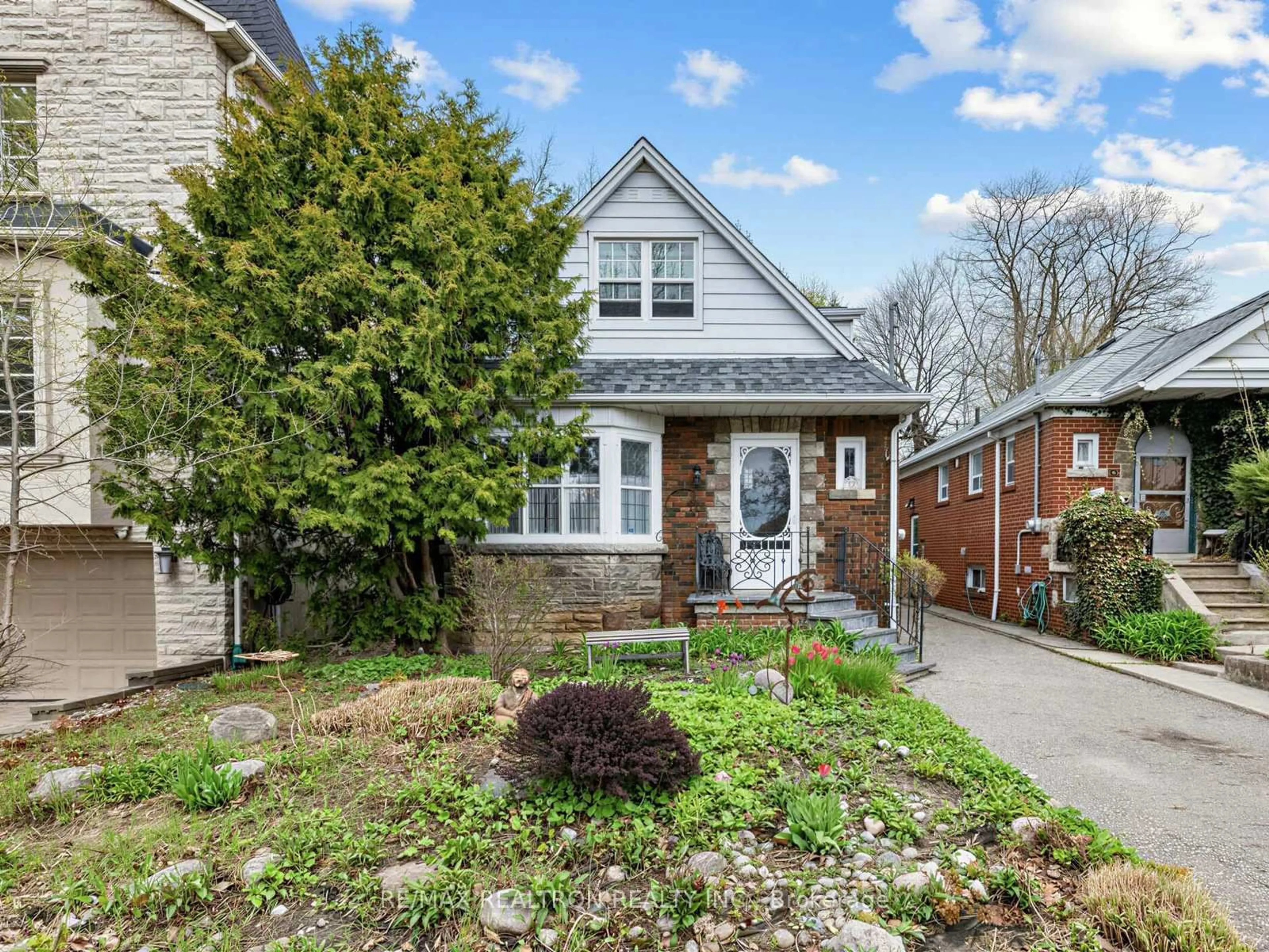 Home with brick exterior material, street for 12 New Haven Dr, Toronto Ontario M5N 1H7