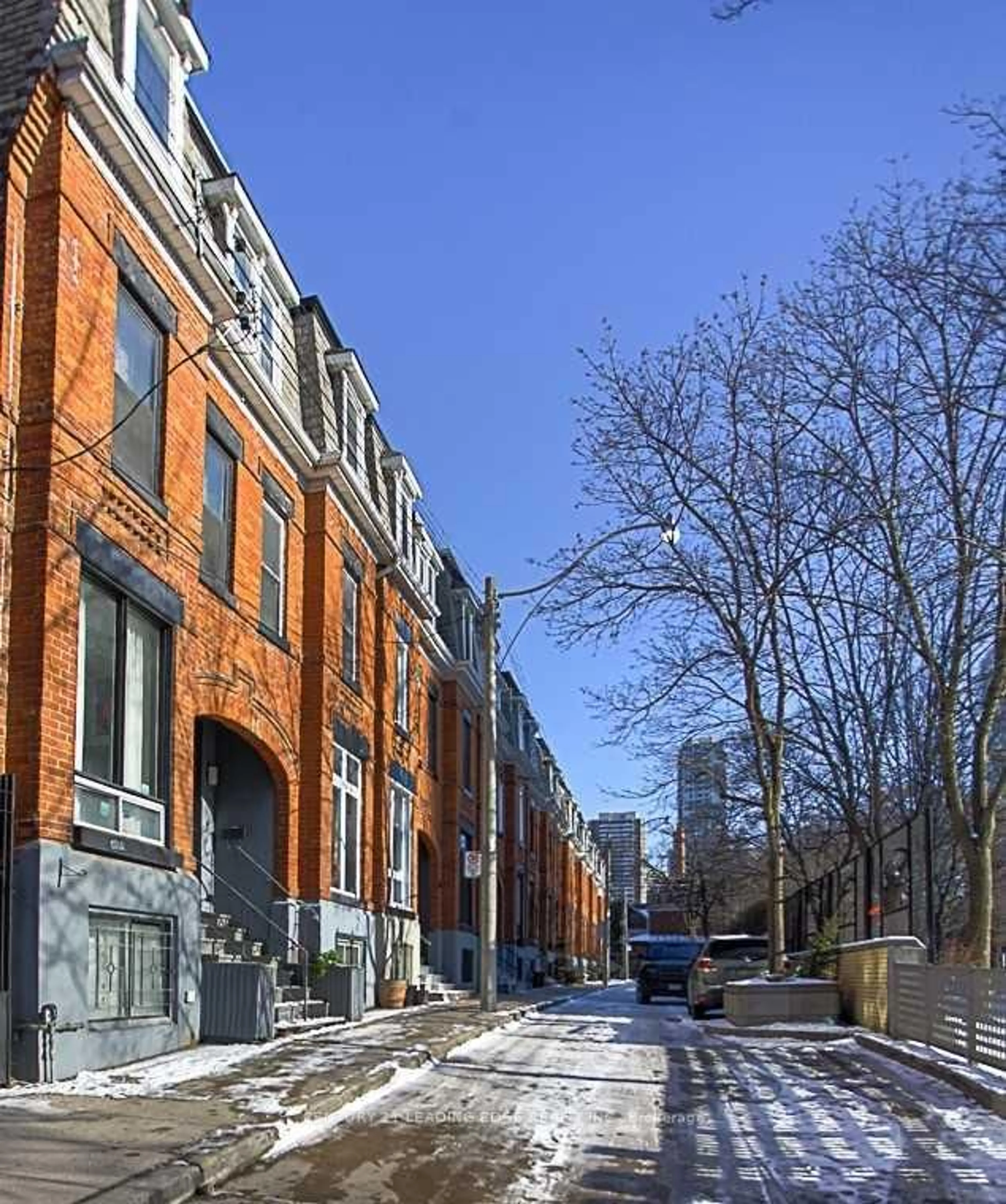 Home with brick exterior material, street for 2 Monteith St, Toronto Ontario M4Y 1K7