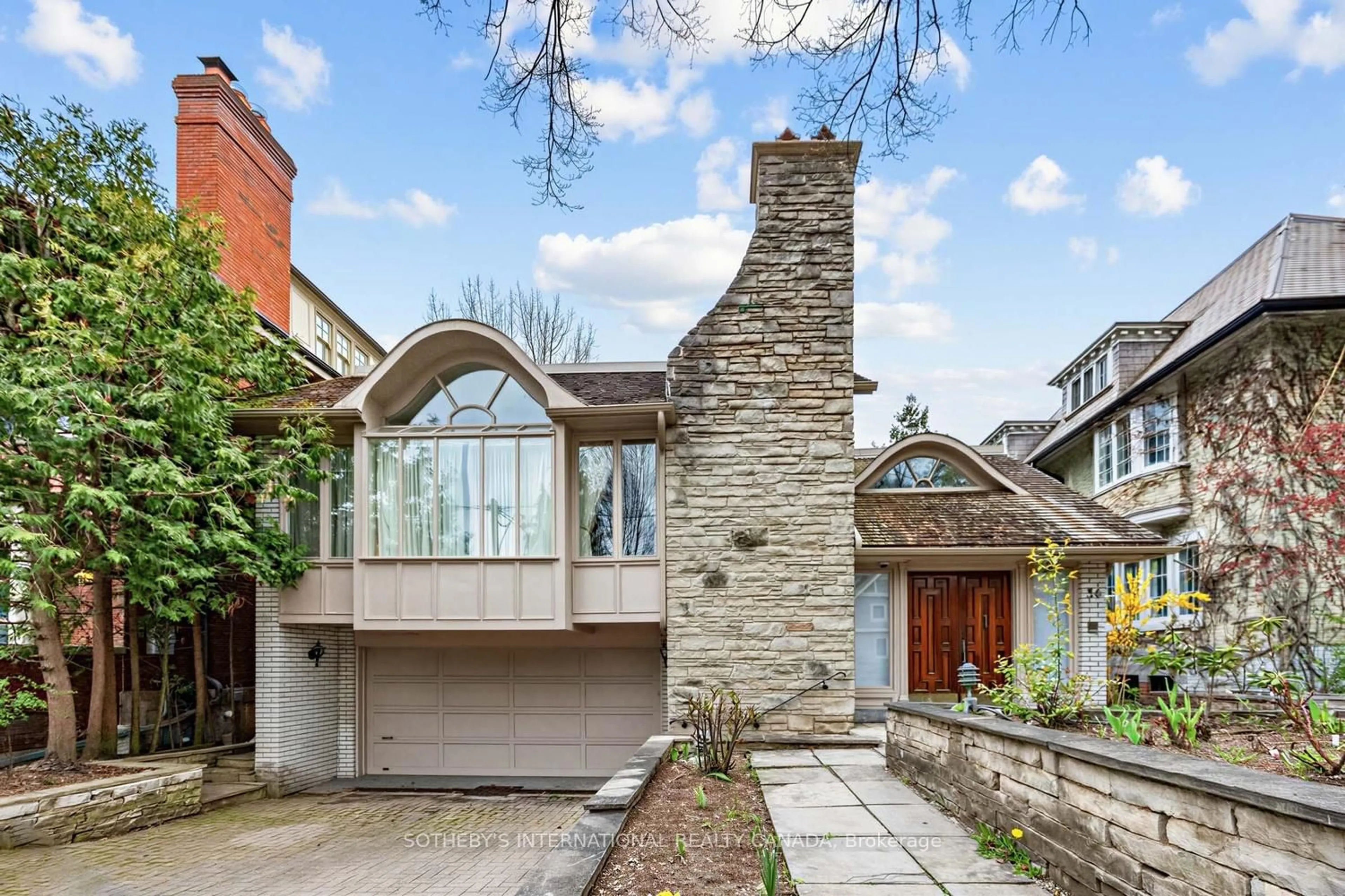 Home with brick exterior material, street for 36 Hawthorn Ave, Toronto Ontario M4W 2Z2