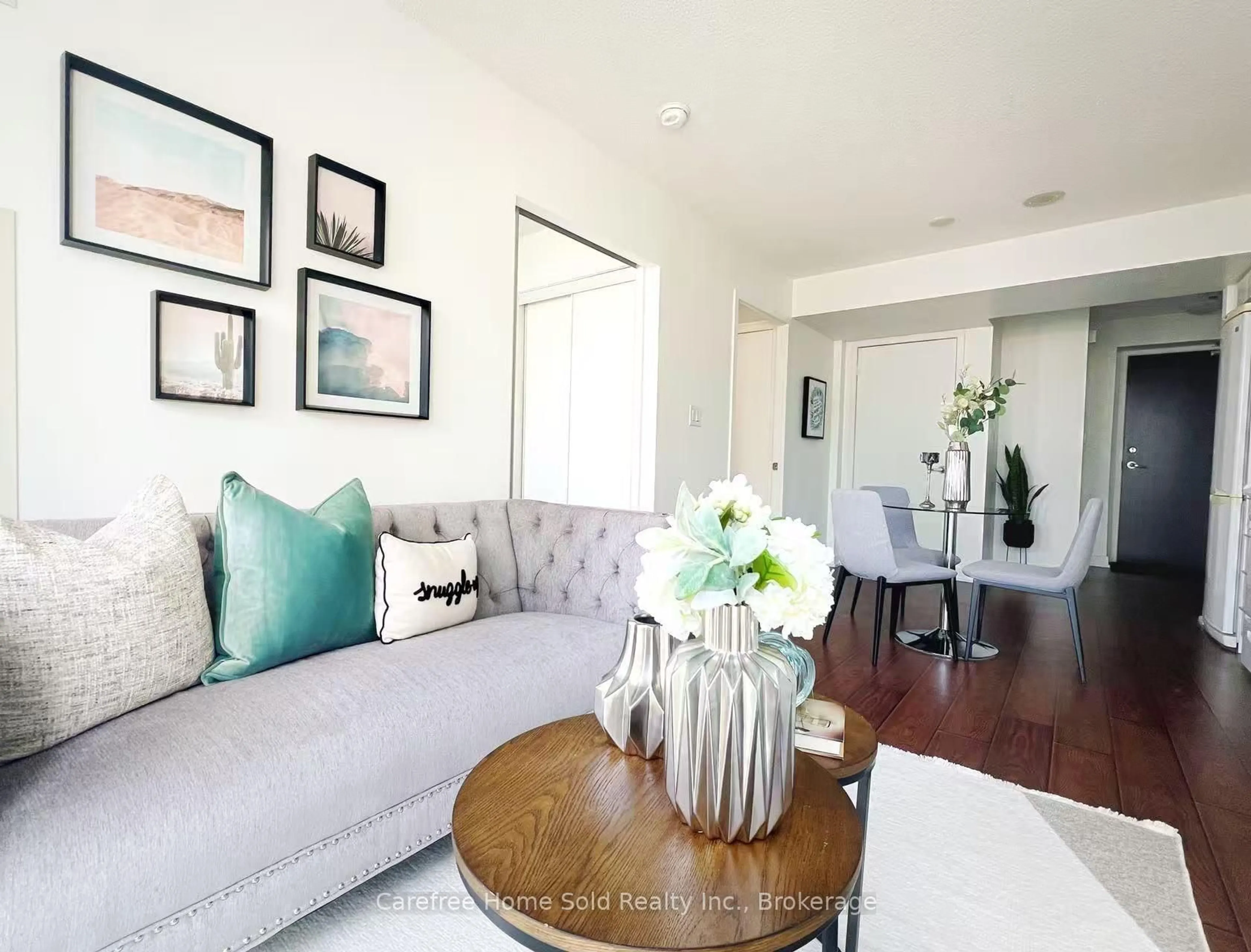 Living room with furniture, wood/laminate floor for 25 Capreol Crt #1108, Toronto Ontario M5V 3Z7