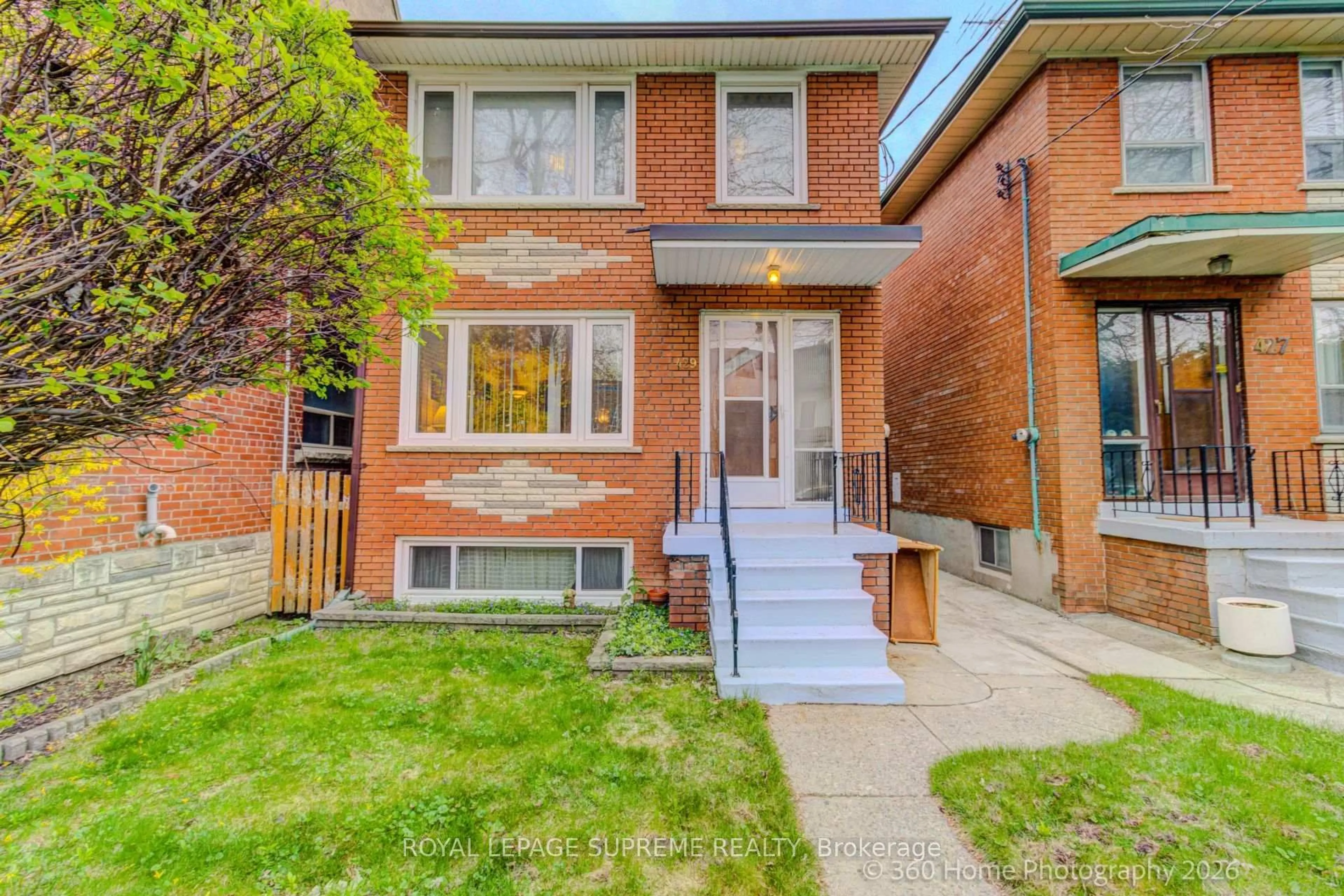 Home with brick exterior material, street for 429 St Clarens Ave, Toronto Ontario M6H 3W2