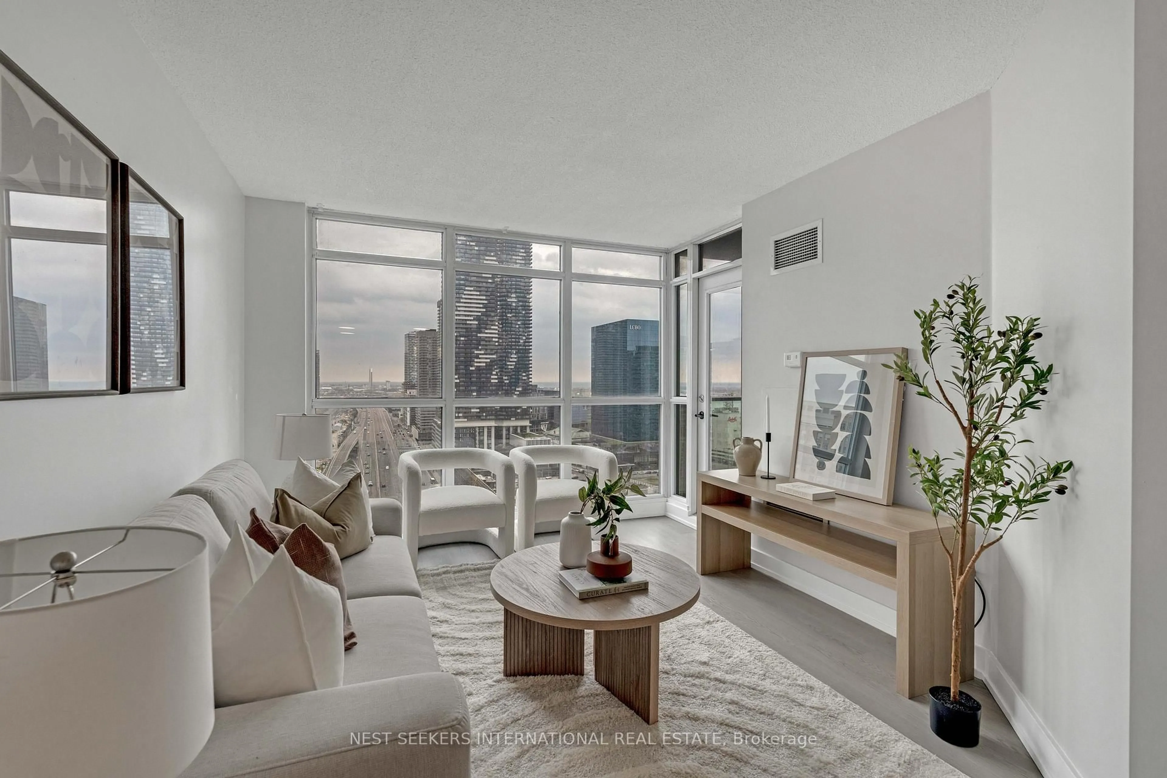 Living room with furniture, unknown for 18 Yonge St #2507, Toronto Ontario M5E 1Z8