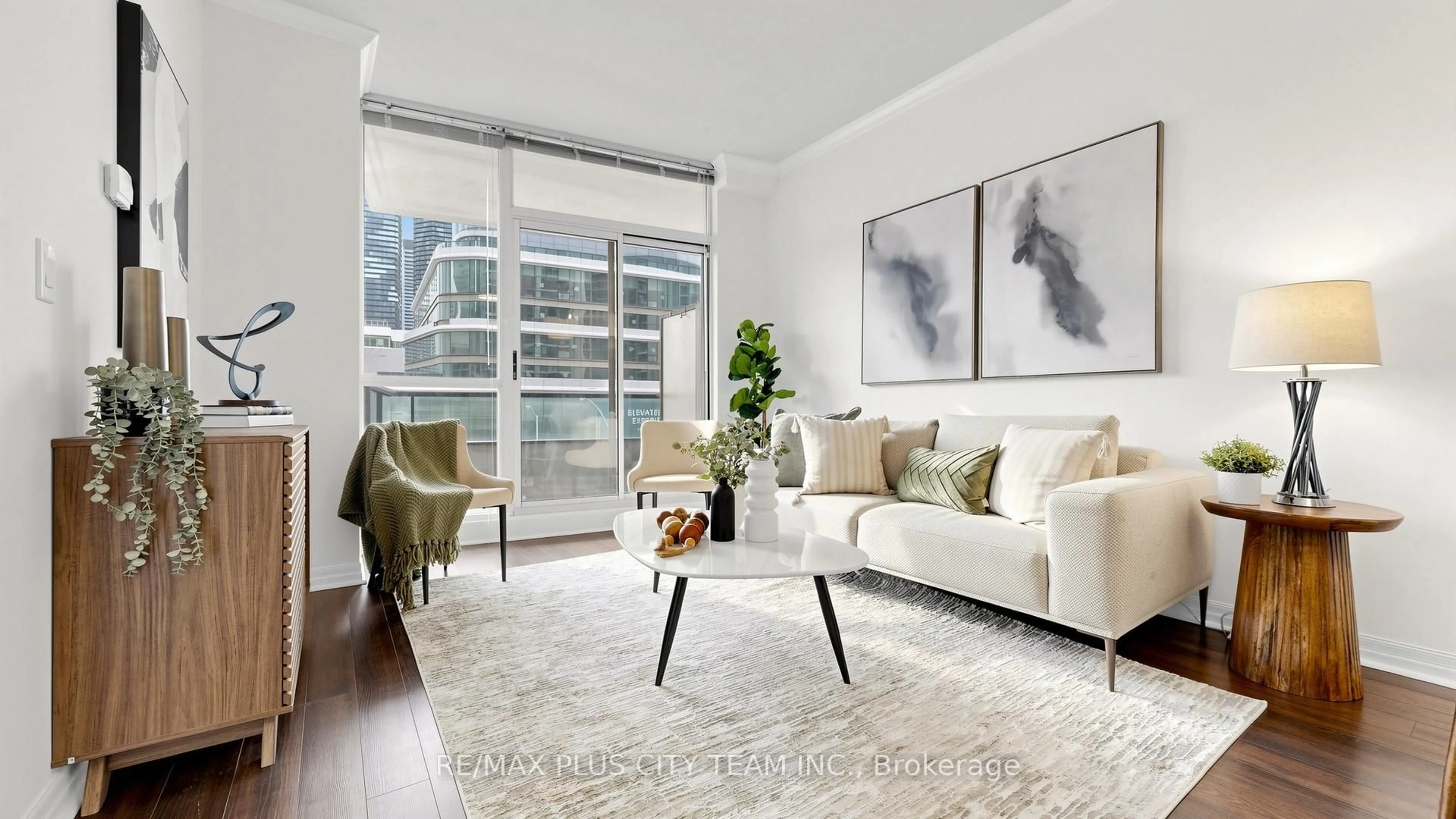 Living room with furniture, unknown for 16 Yonge St #303, Toronto Ontario M5E 2A1