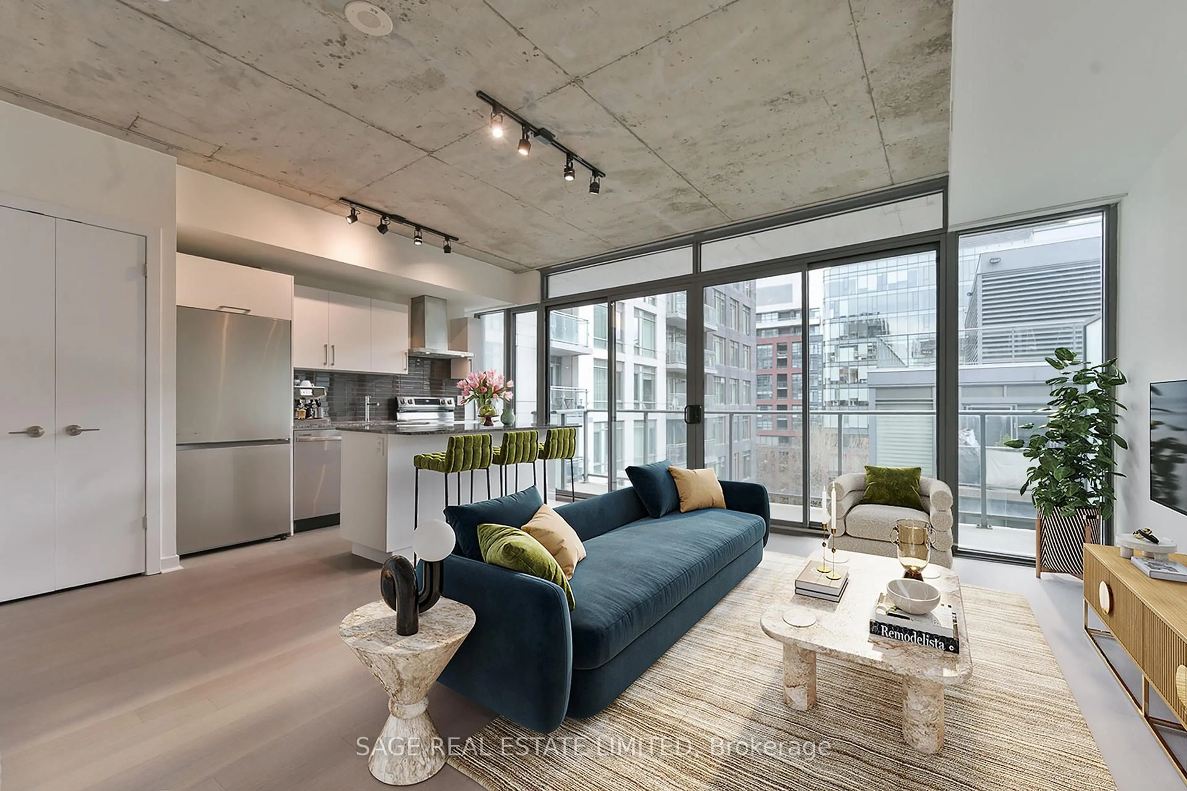 Living room with furniture, cement floor for 95 Bathurst St #914, Toronto Ontario M5V 0H7