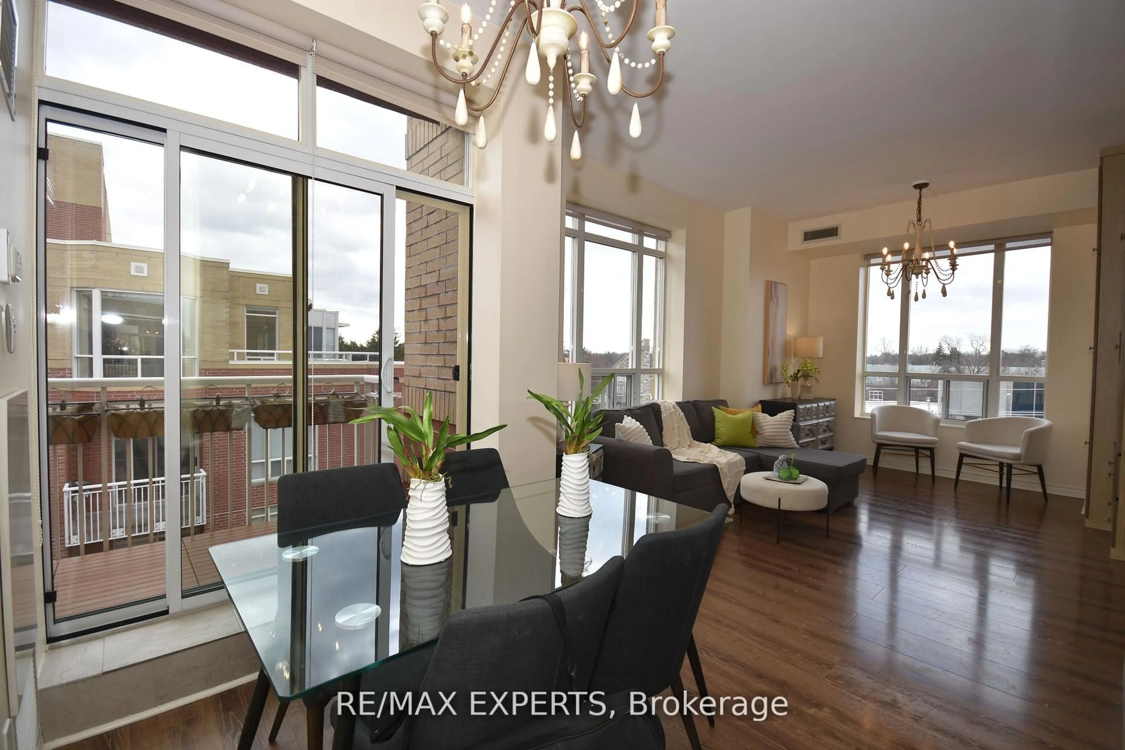 Living room with furniture, wood/laminate floor for 481 Rosewell Ave #506, Toronto Ontario M4R 2J1
