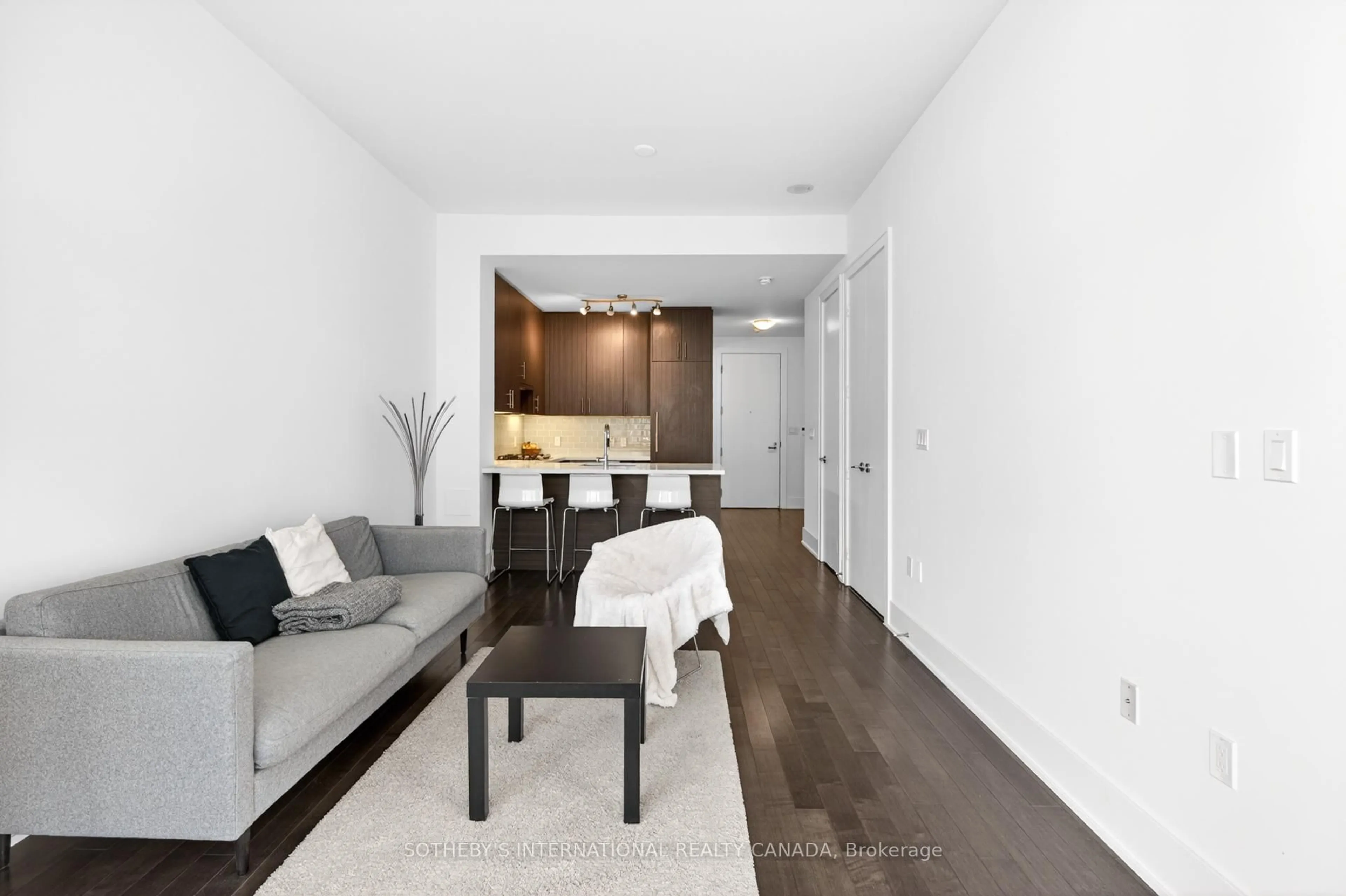 Living room with furniture, wood/laminate floor for 39 Queens Quay #816, Toronto Ontario M5E 0A5