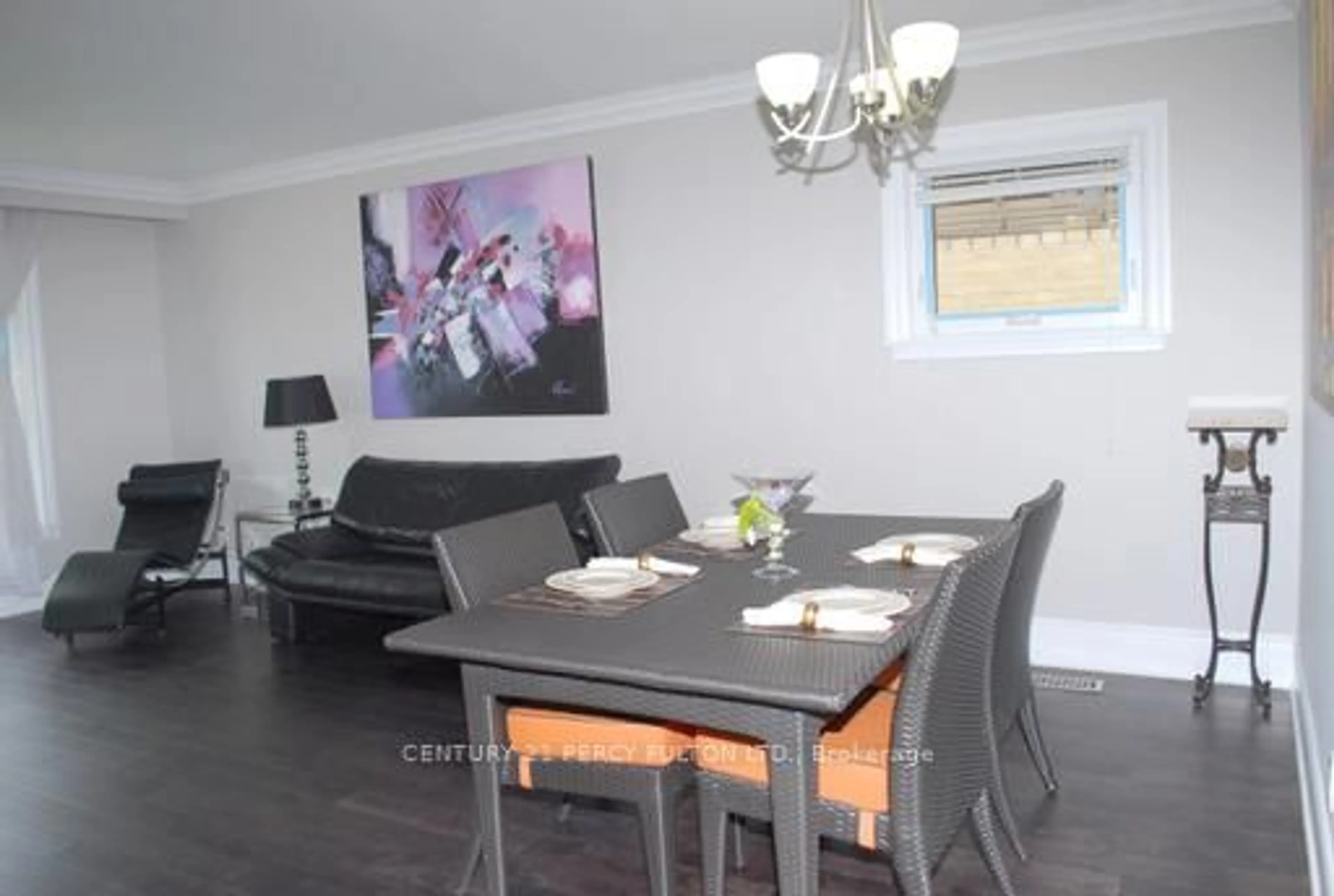Dining room, wood/laminate floor for 66 Acton Ave, Toronto Ontario M3H 4H1