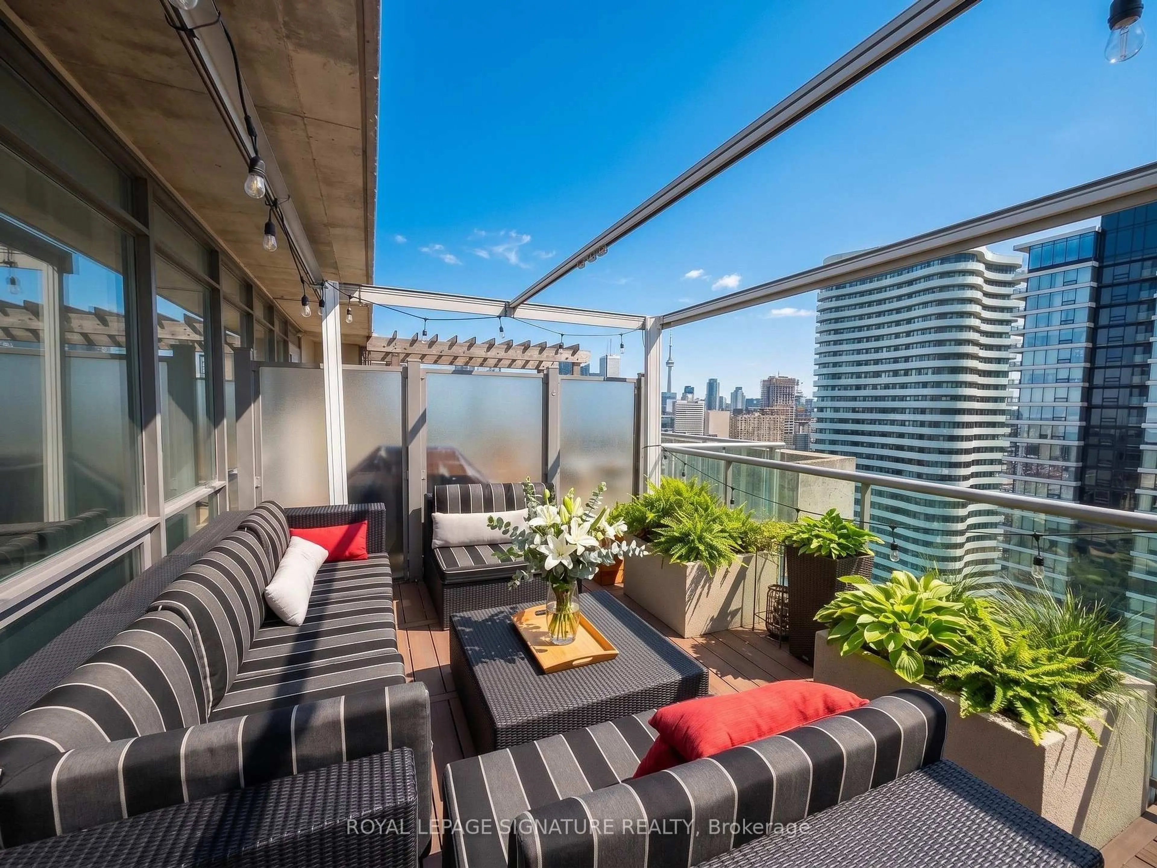 Patio, city buildings view from balcony for 281 Mutual St #PH5, Toronto Ontario M4Y 3C4