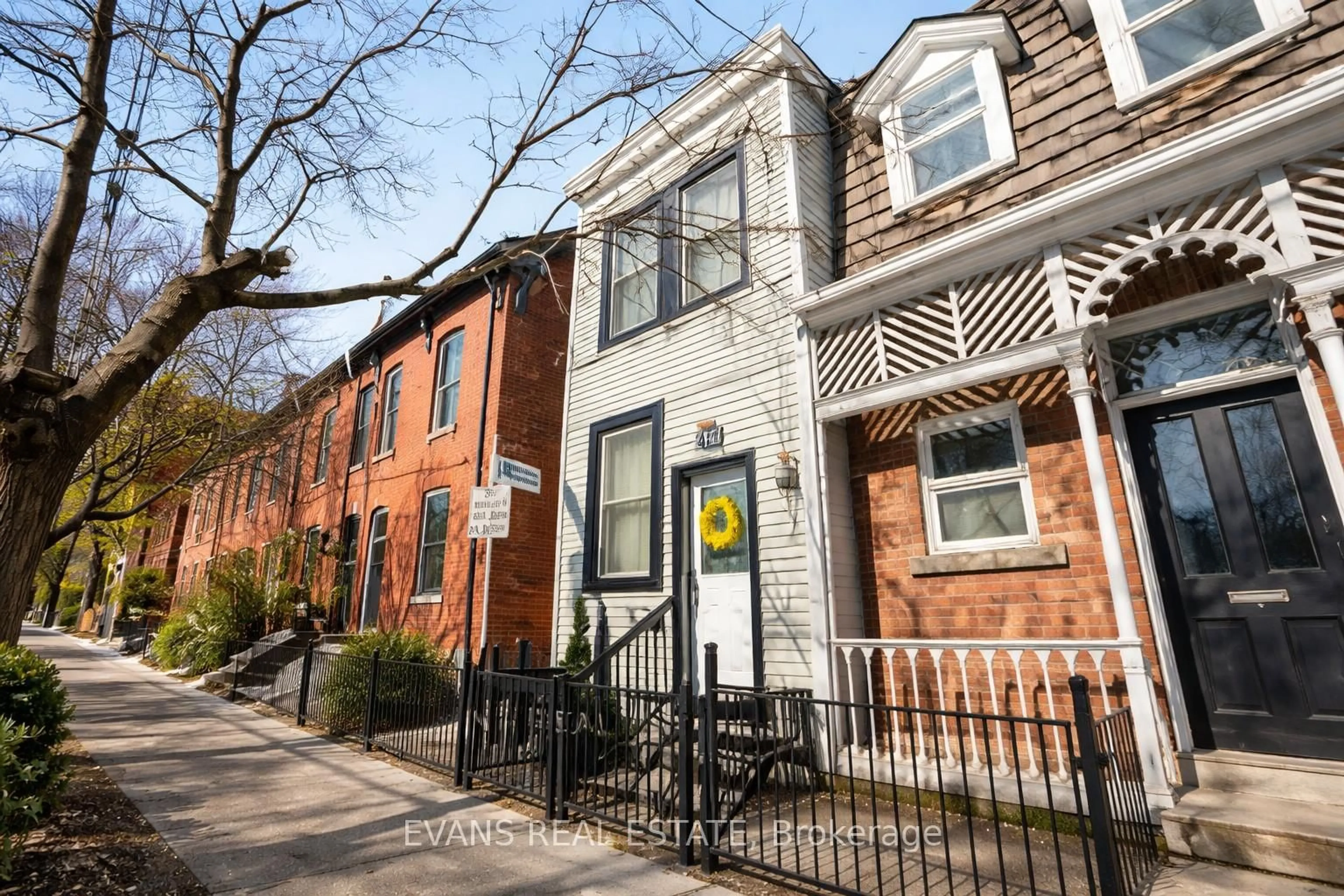 Home with brick exterior material, street for 448 Gerrard St, Toronto Ontario M5A 2H2