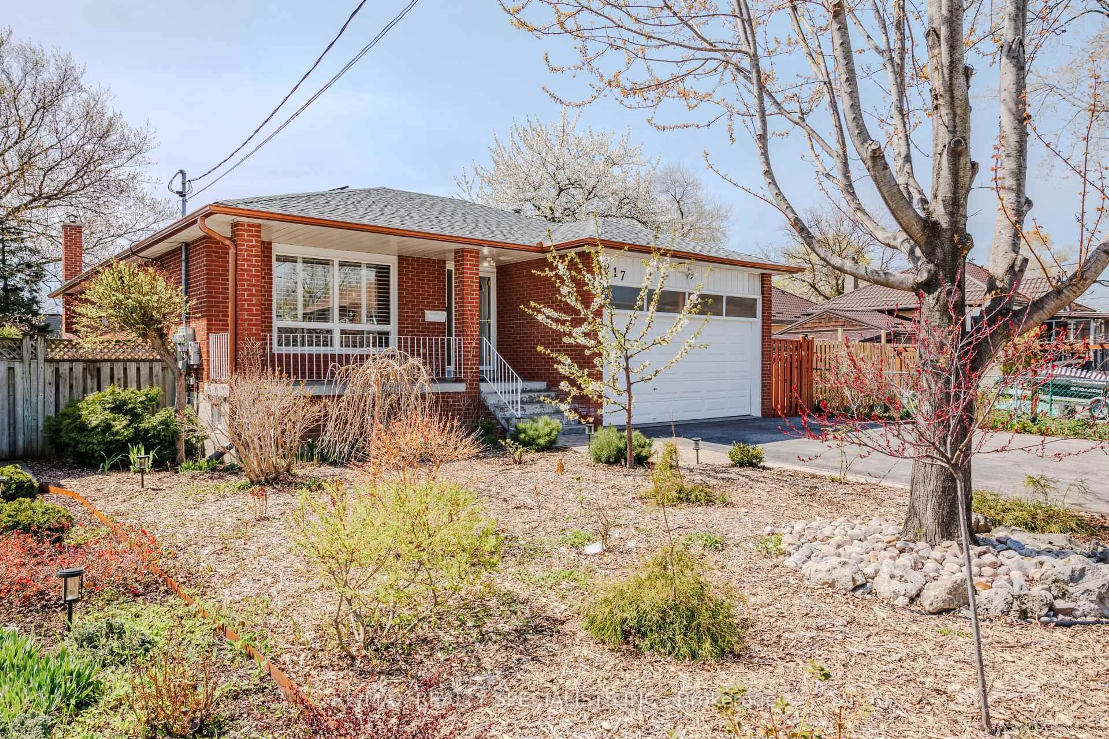 Home with brick exterior material, street for 217 Mcallister Rd, Toronto Ontario M3H 2P1