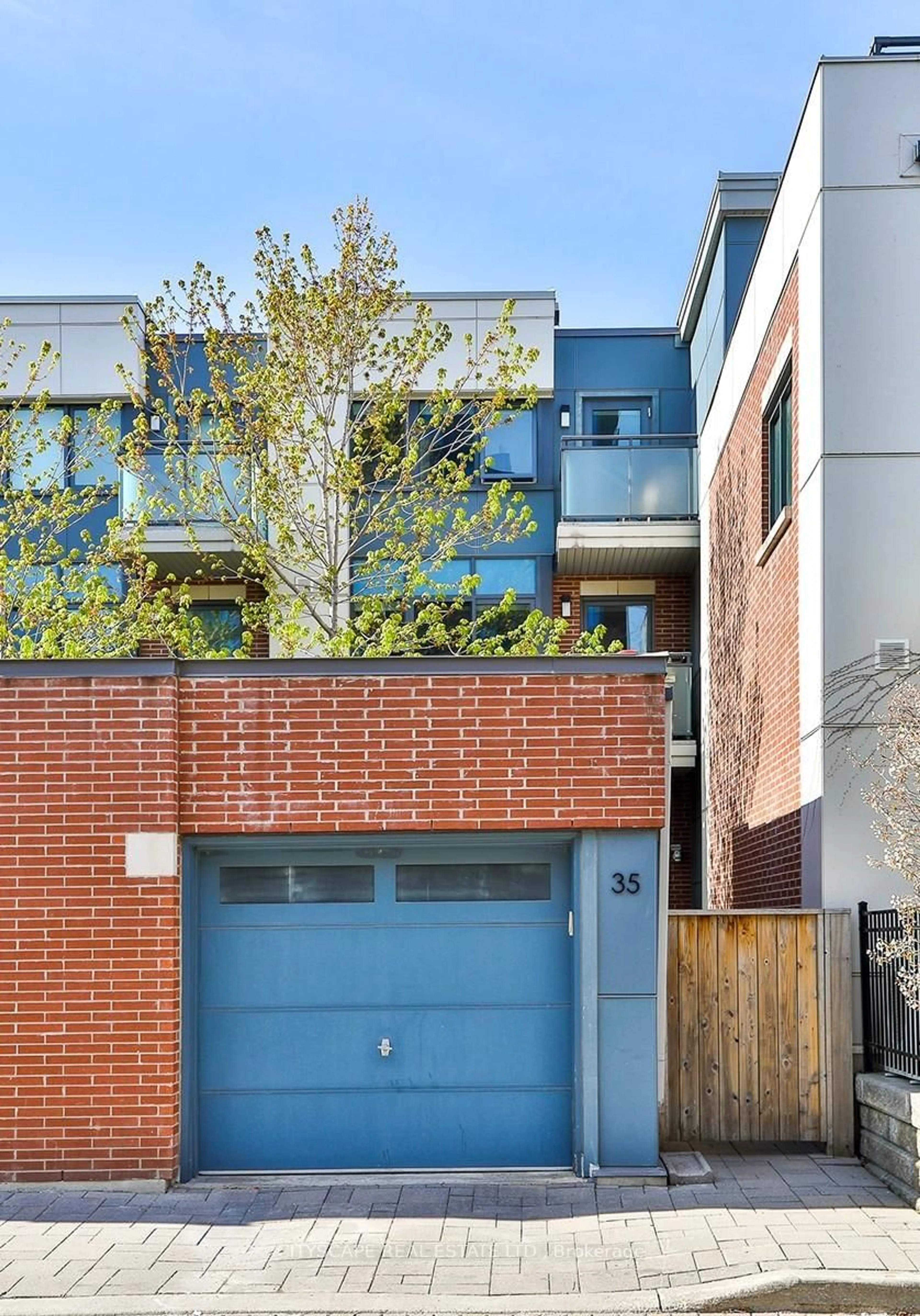 Home with brick exterior material, street for 35 Oak St, Toronto Ontario M5A 0A2
