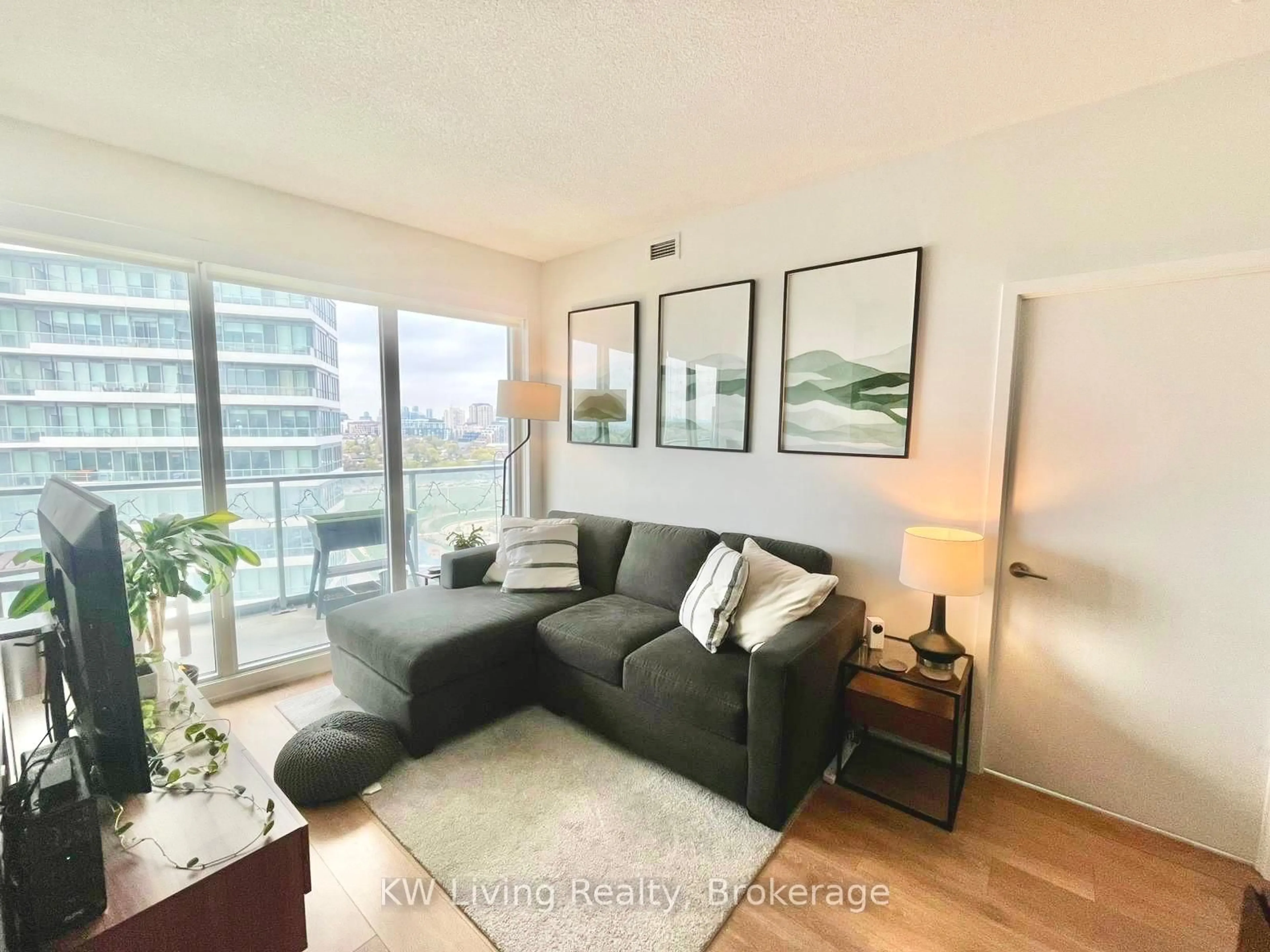 Living room with furniture, wood/laminate floor for 117 McMahon Dr #1906, Toronto Ontario M2K 0E4