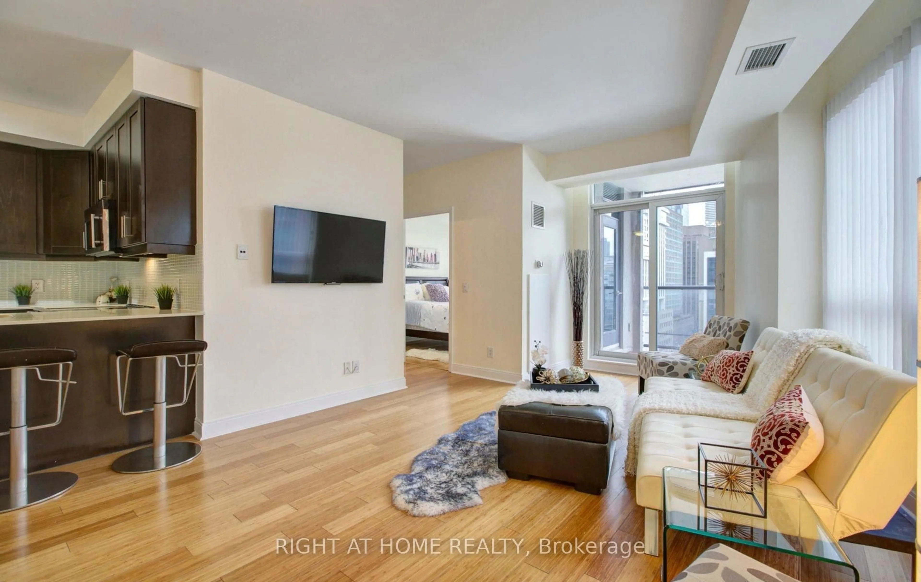 Living room with furniture, unknown for 1 Scott St #1409, Toronto Ontario M5E 1A1
