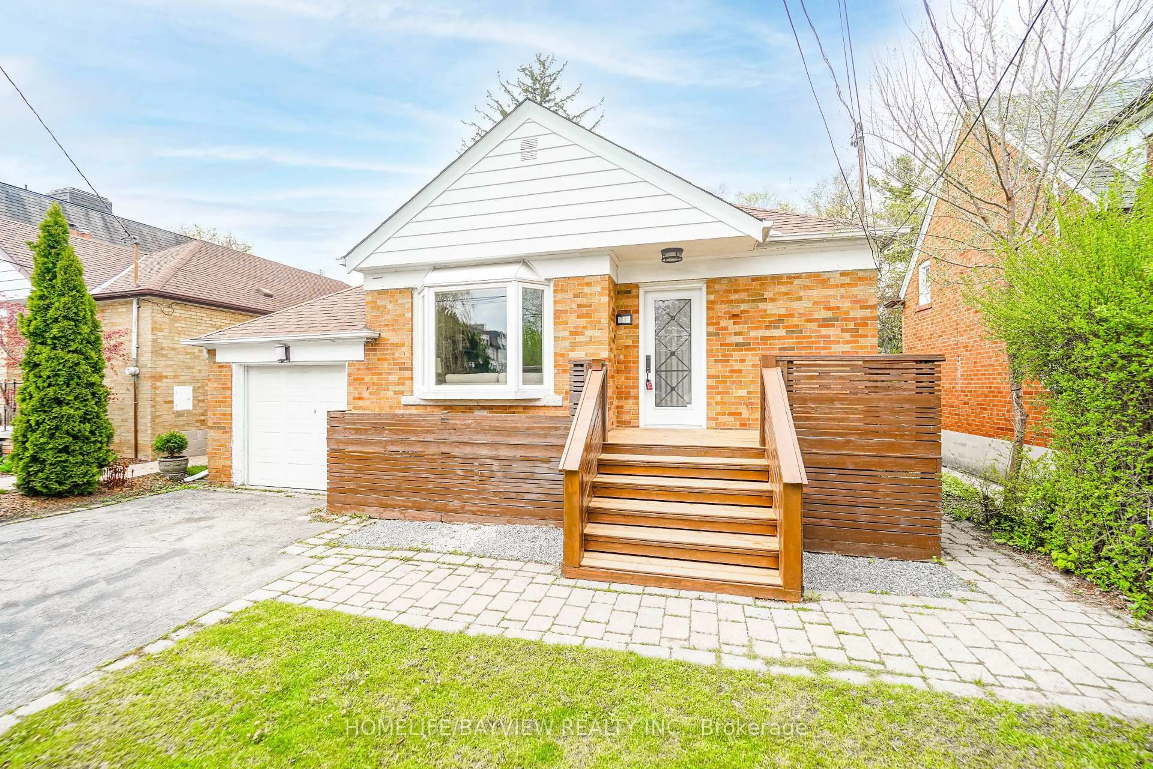 Home with brick exterior material, street for 14 Easton Rd, Toronto Ontario M2N 2L3