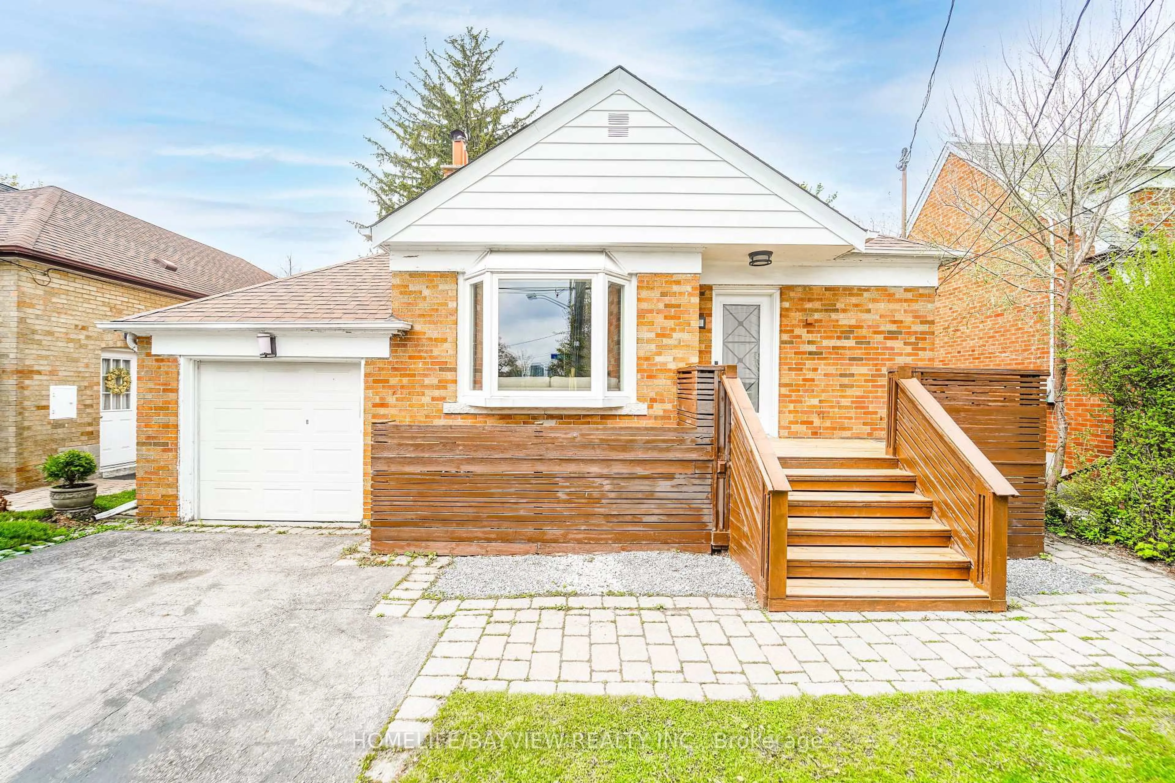Home with brick exterior material, street for 14 Easton Rd, Toronto Ontario M2N 2L3
