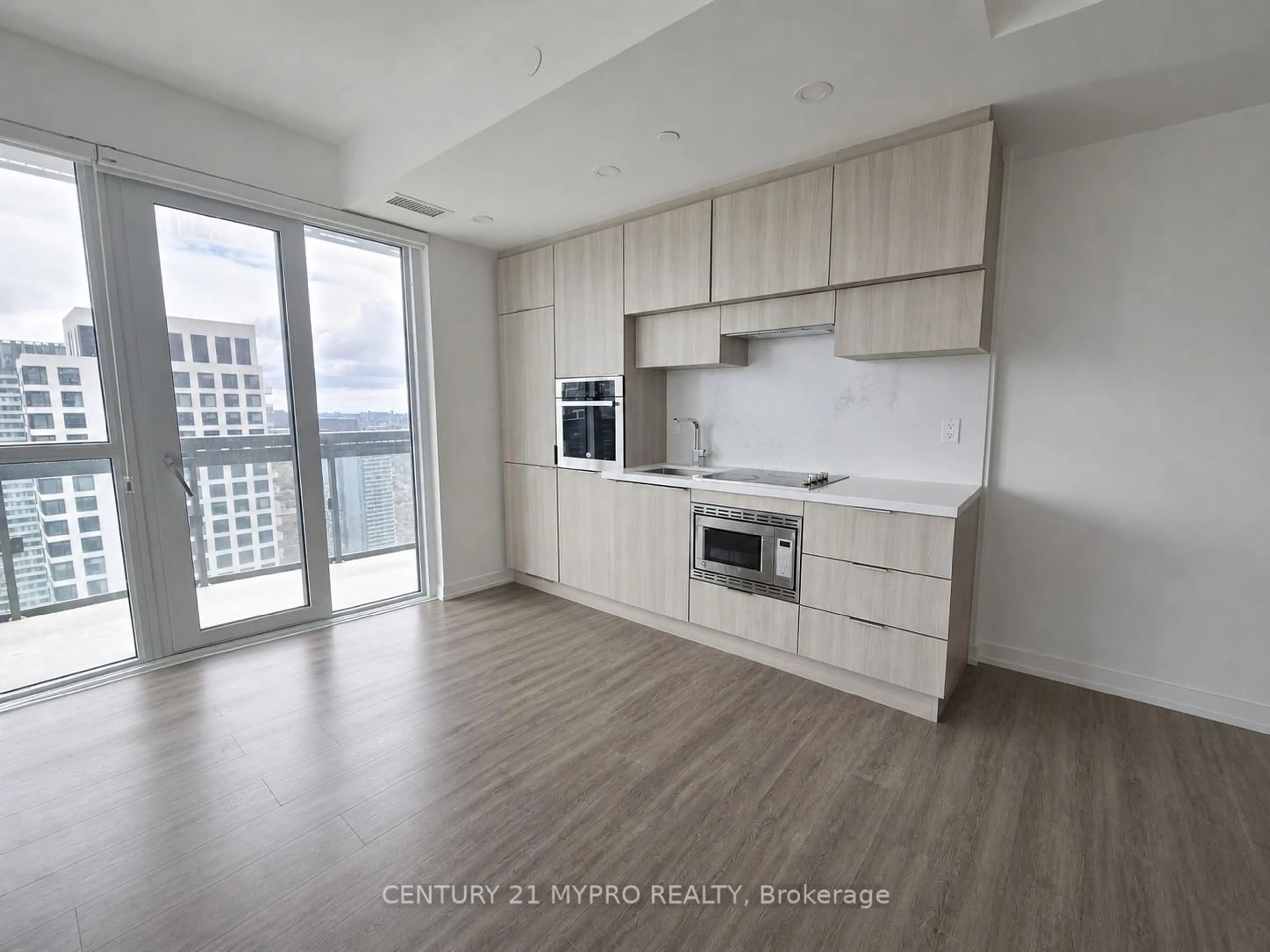 Open concept kitchen, wood/laminate floor for 39 Roehampton Ave #3409, Toronto Ontario M4P 0G1