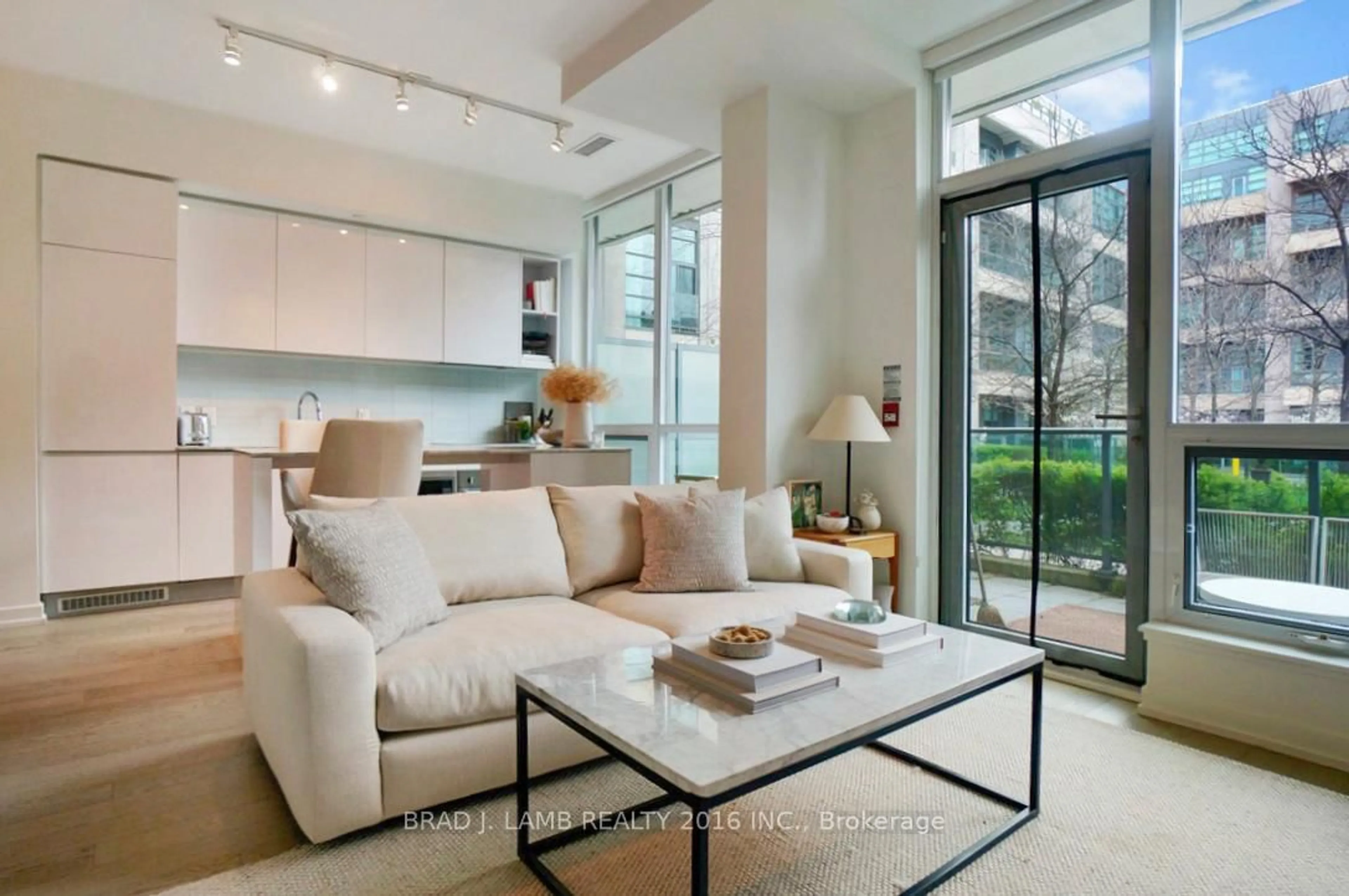 Living room with furniture, unknown for 377 Madison Ave #102, Toronto Ontario M4V 3E1