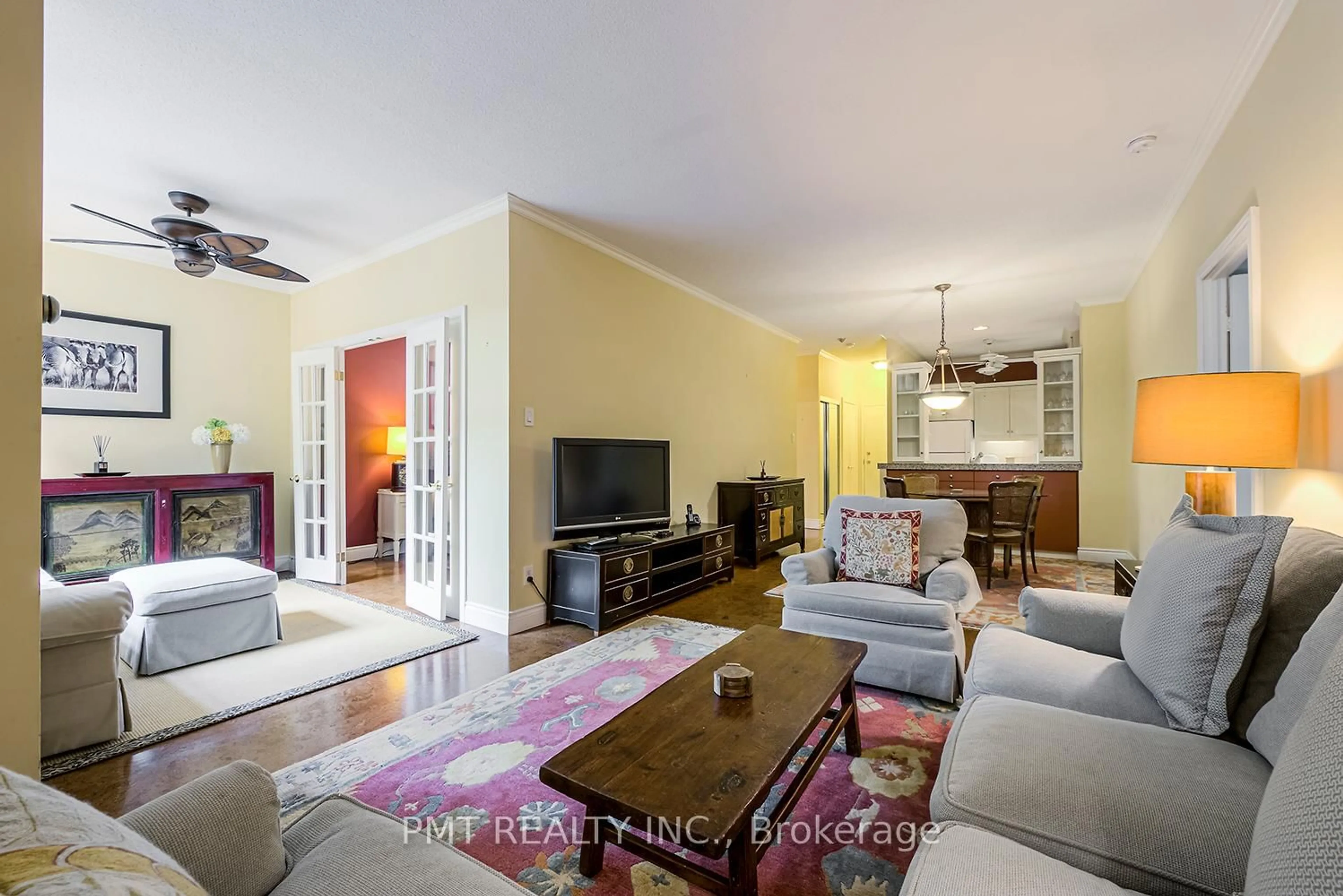 Living room with furniture, wood/laminate floor for 95 Prince Arthur Ave #103, Toronto Ontario M5R 3P6