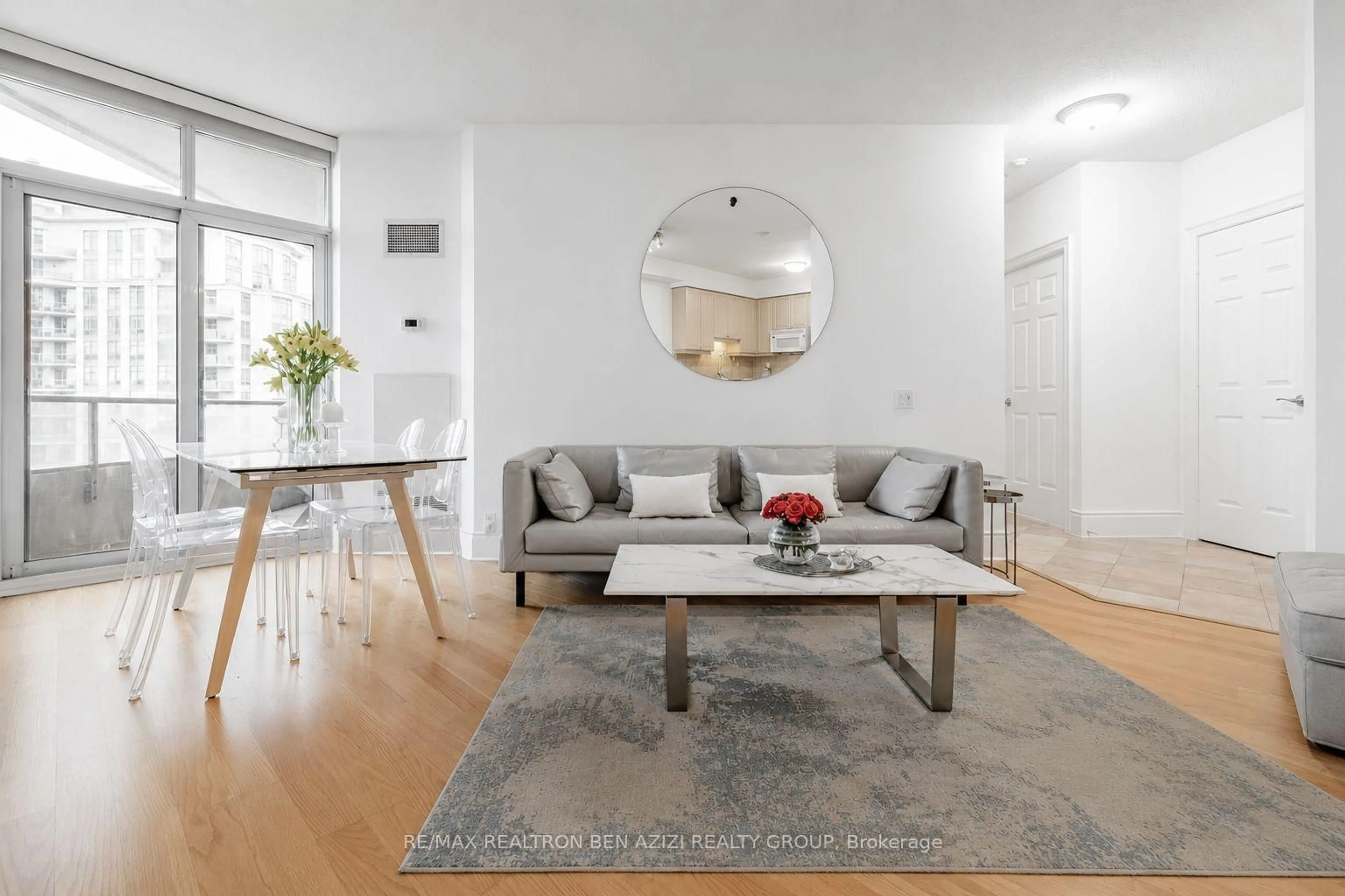 Living room with furniture, wood/laminate floor for 80 Harrison garden Blvd #2324, Toronto Ontario M2N 7E3
