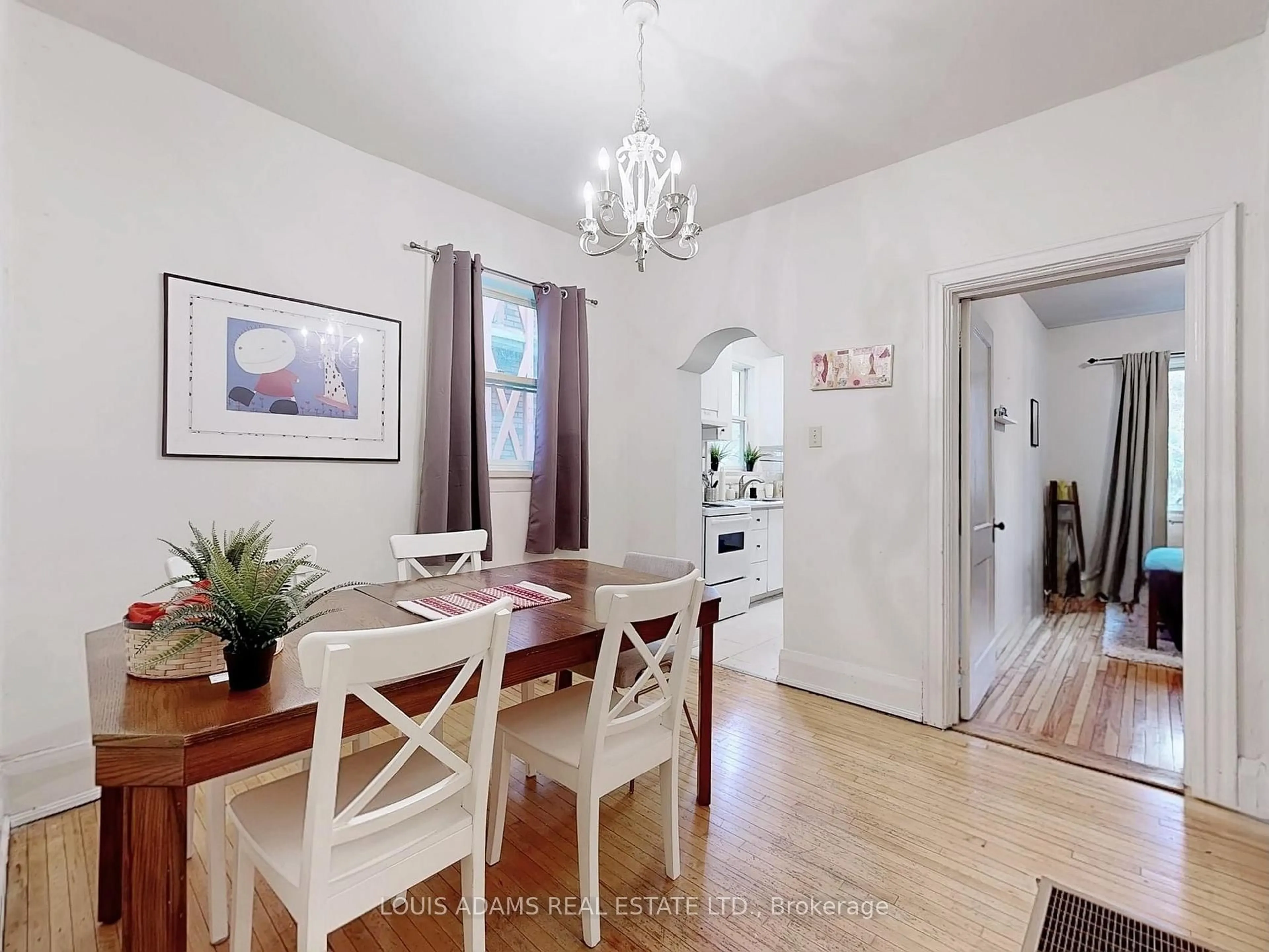 Dining room, wood/laminate floor for 499 Palmerston Blvd, Toronto Ontario M6G 2P2