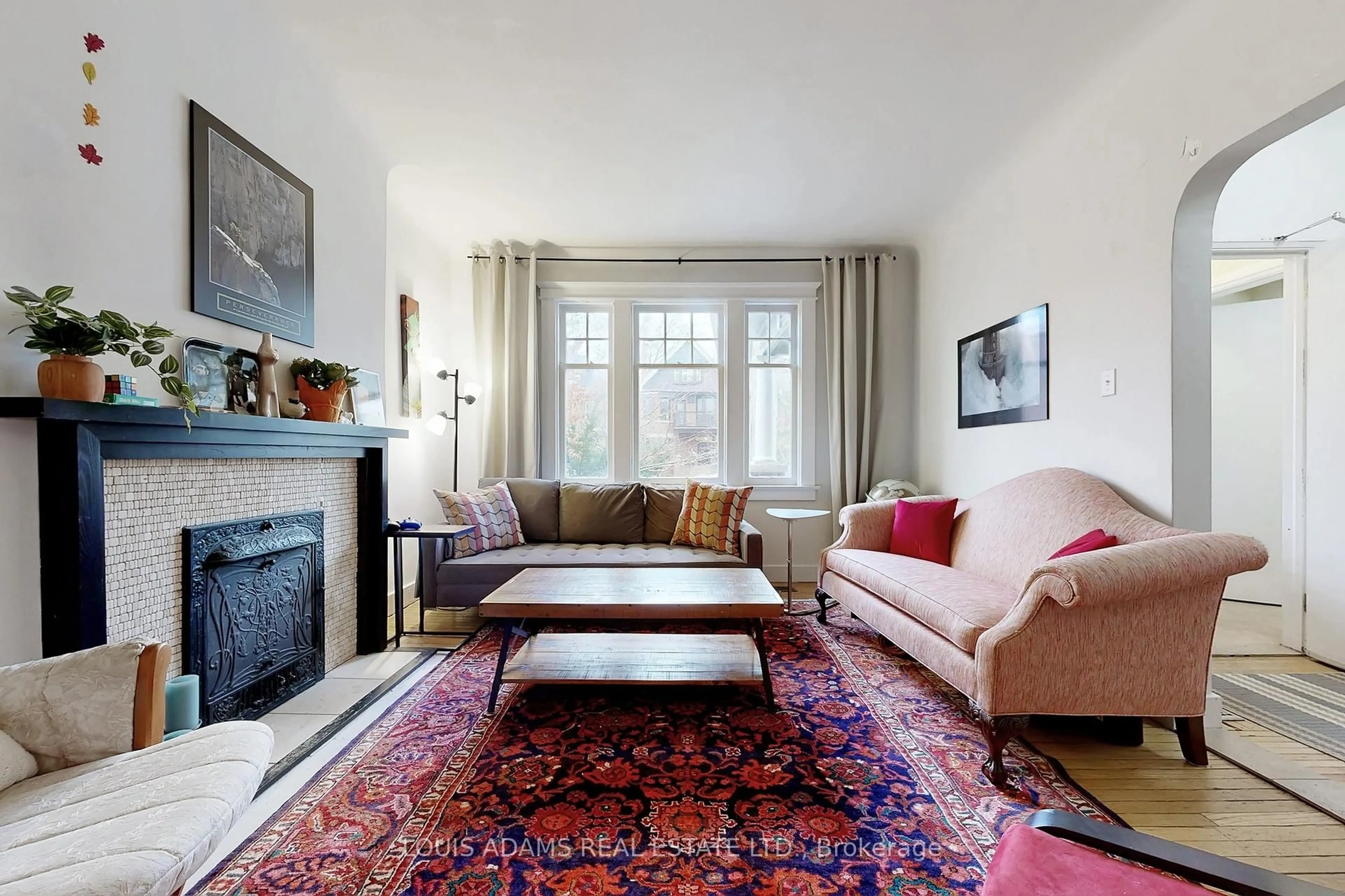 Living room with furniture, carpet floor for 499 Palmerston Blvd, Toronto Ontario M6G 2P2