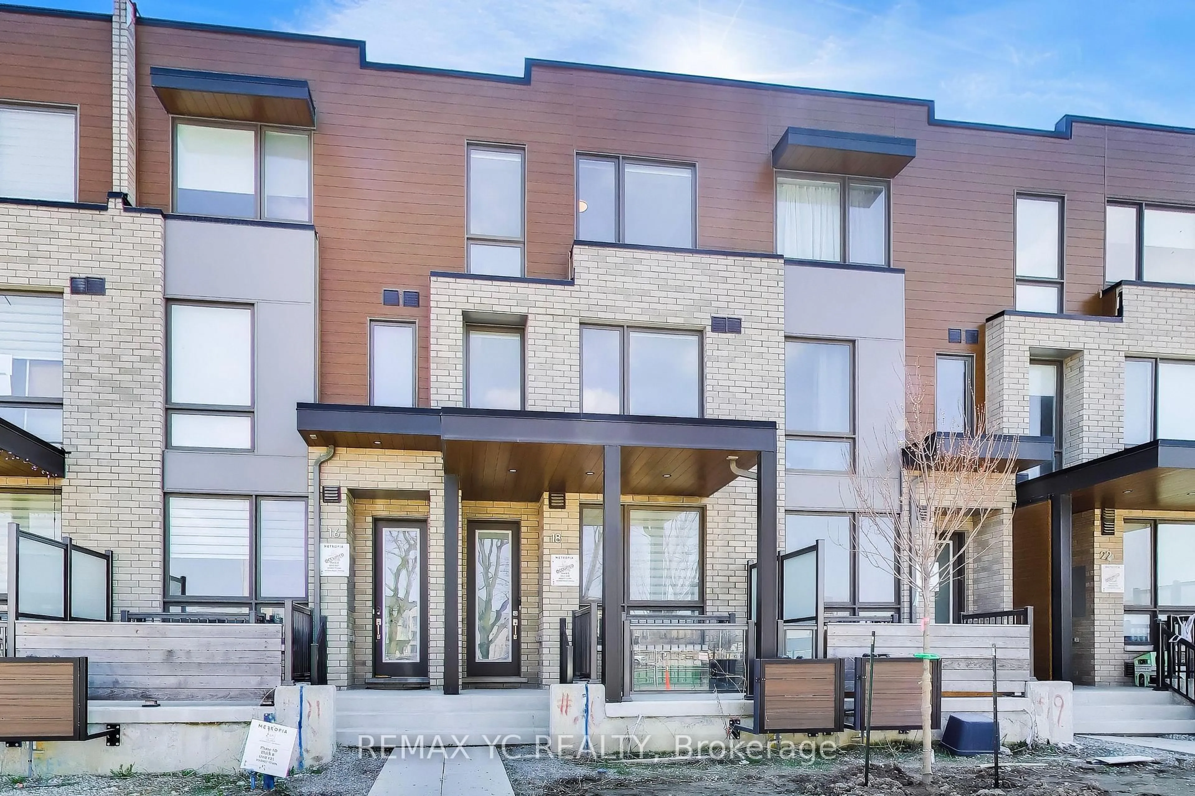 Home with brick exterior material, street for 18 Deep Roots Terr, Toronto Ontario M6A 0G1