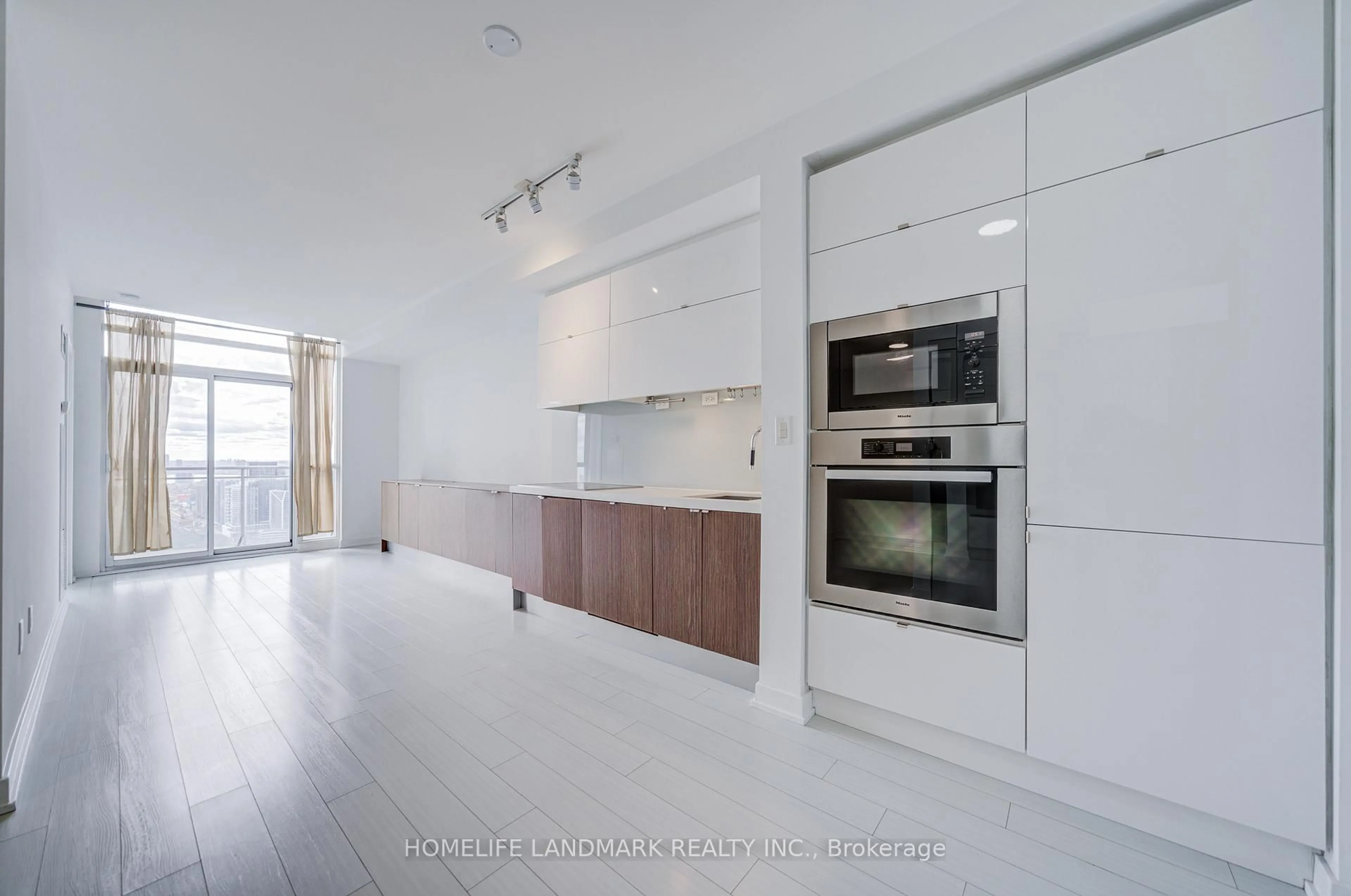 Open concept kitchen, unknown for 21 Iceboat Terr #4911, Toronto Ontario M5V 4A9