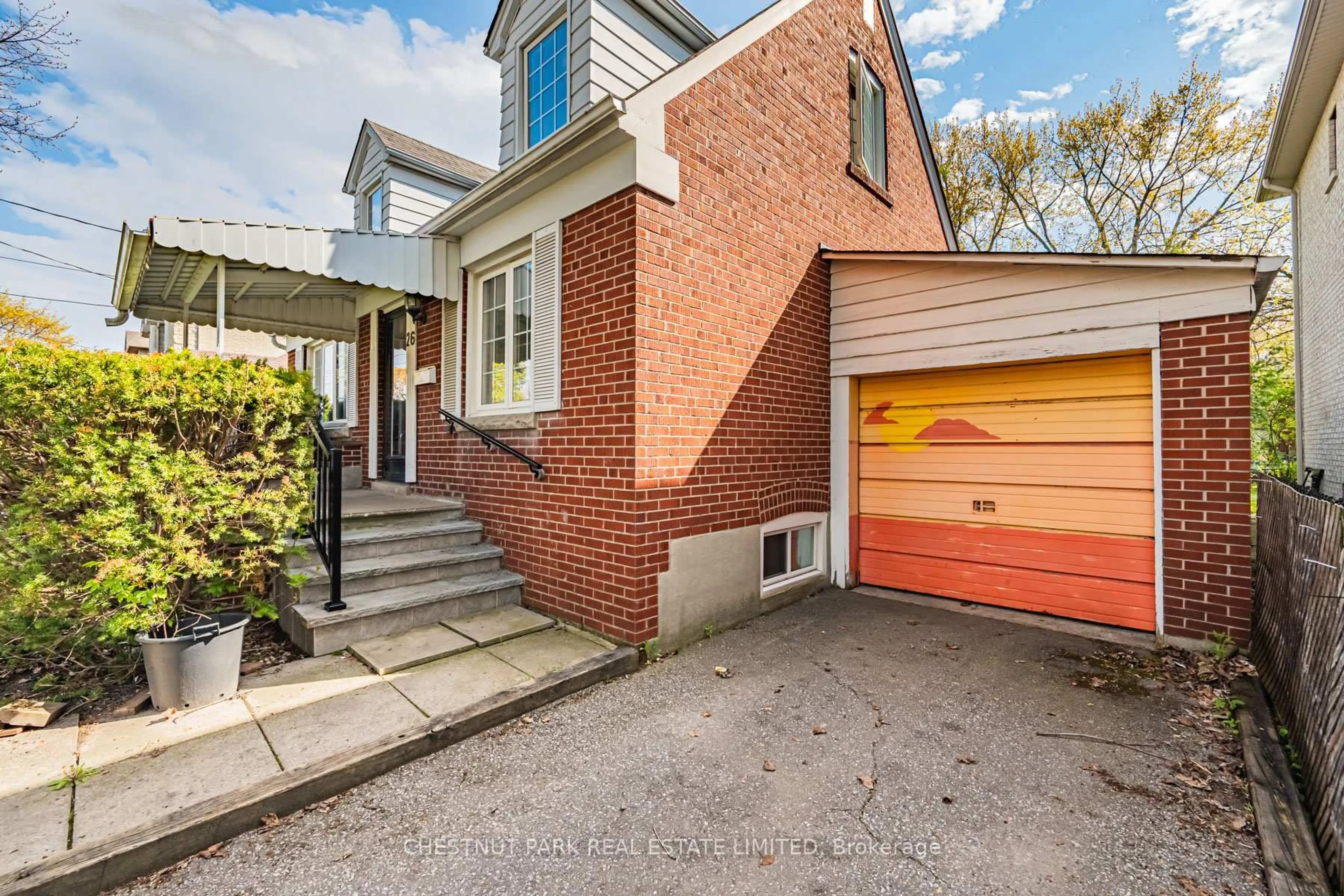 Home with brick exterior material, street for 26 Roberta Dr, Toronto Ontario M6A 2J5