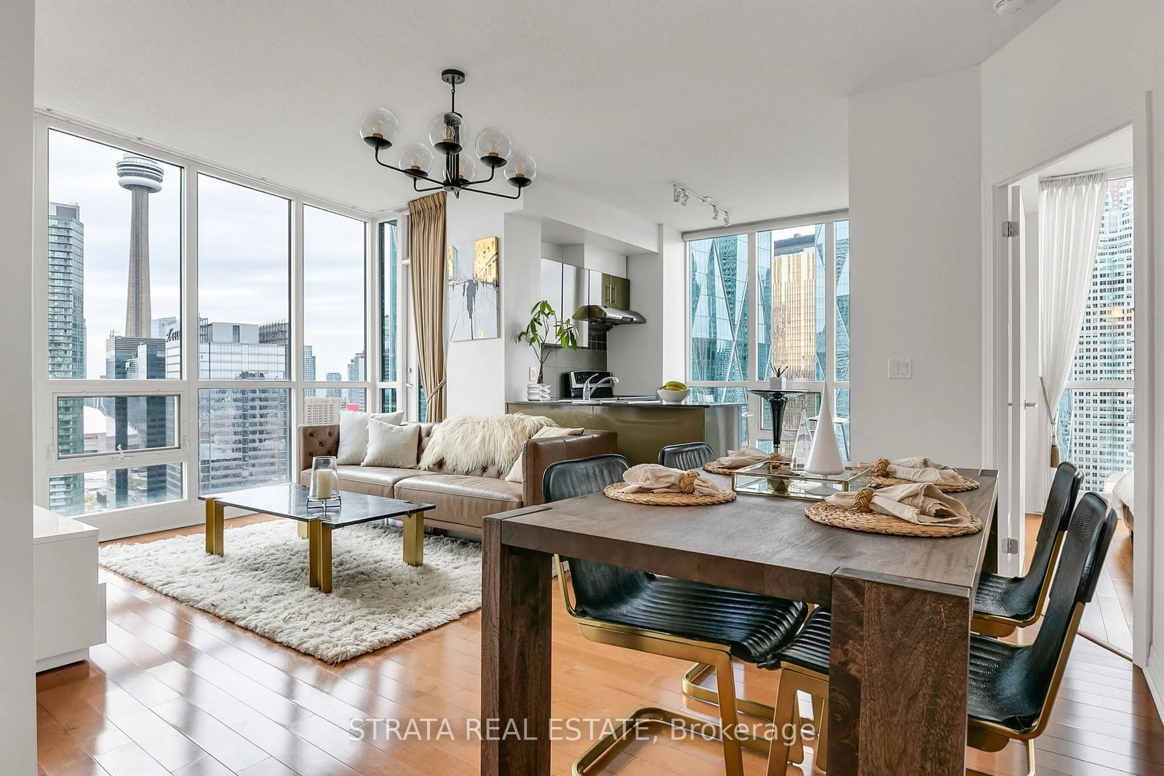 Open concept kitchen, wood/laminate floor for 16 Yonge St #3602, Toronto Ontario M5E 2A1