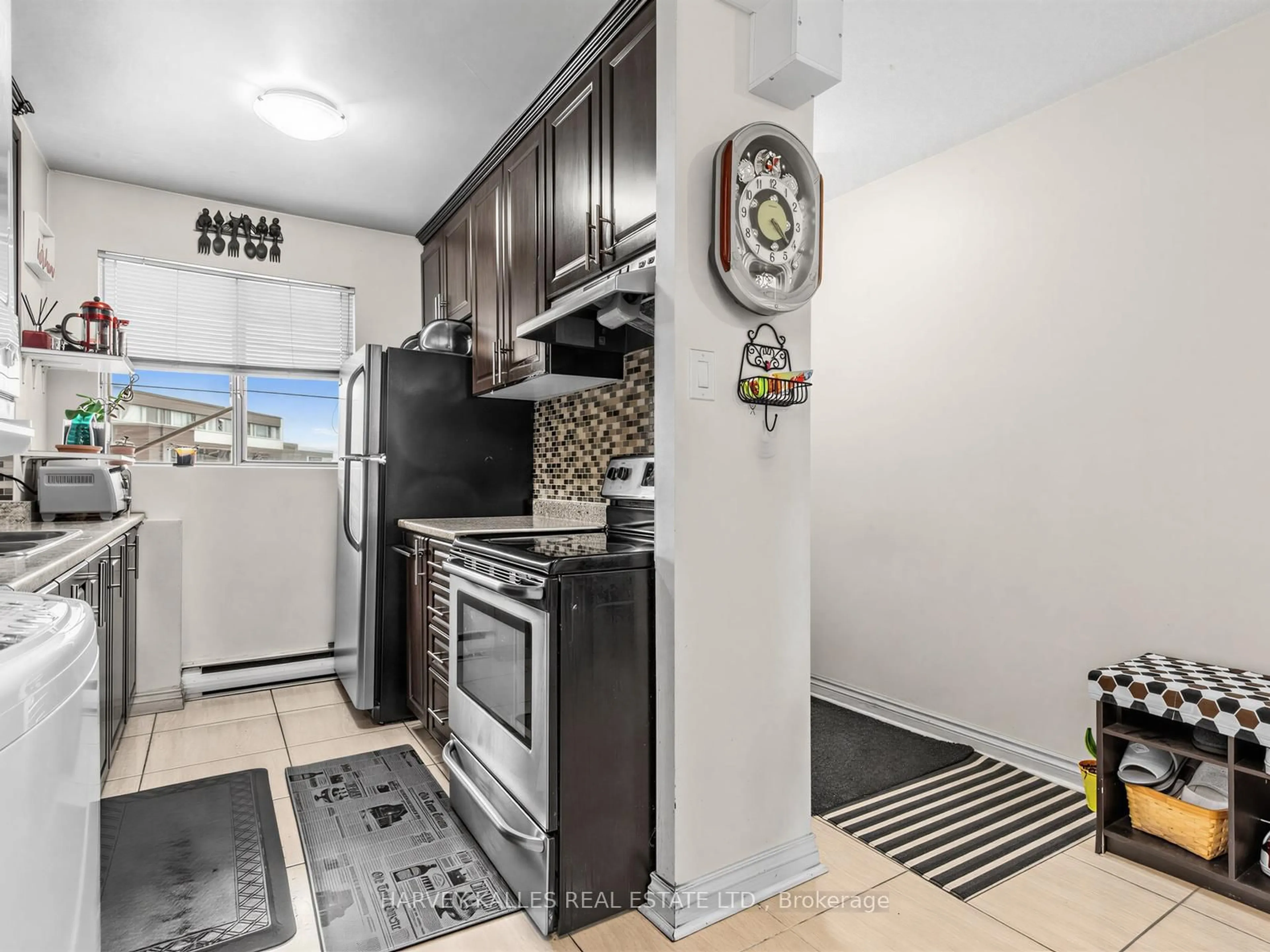 Standard kitchen, ceramic/tile floor for 55 Sunny Glwy #310, Toronto Ontario M3C 2Z5