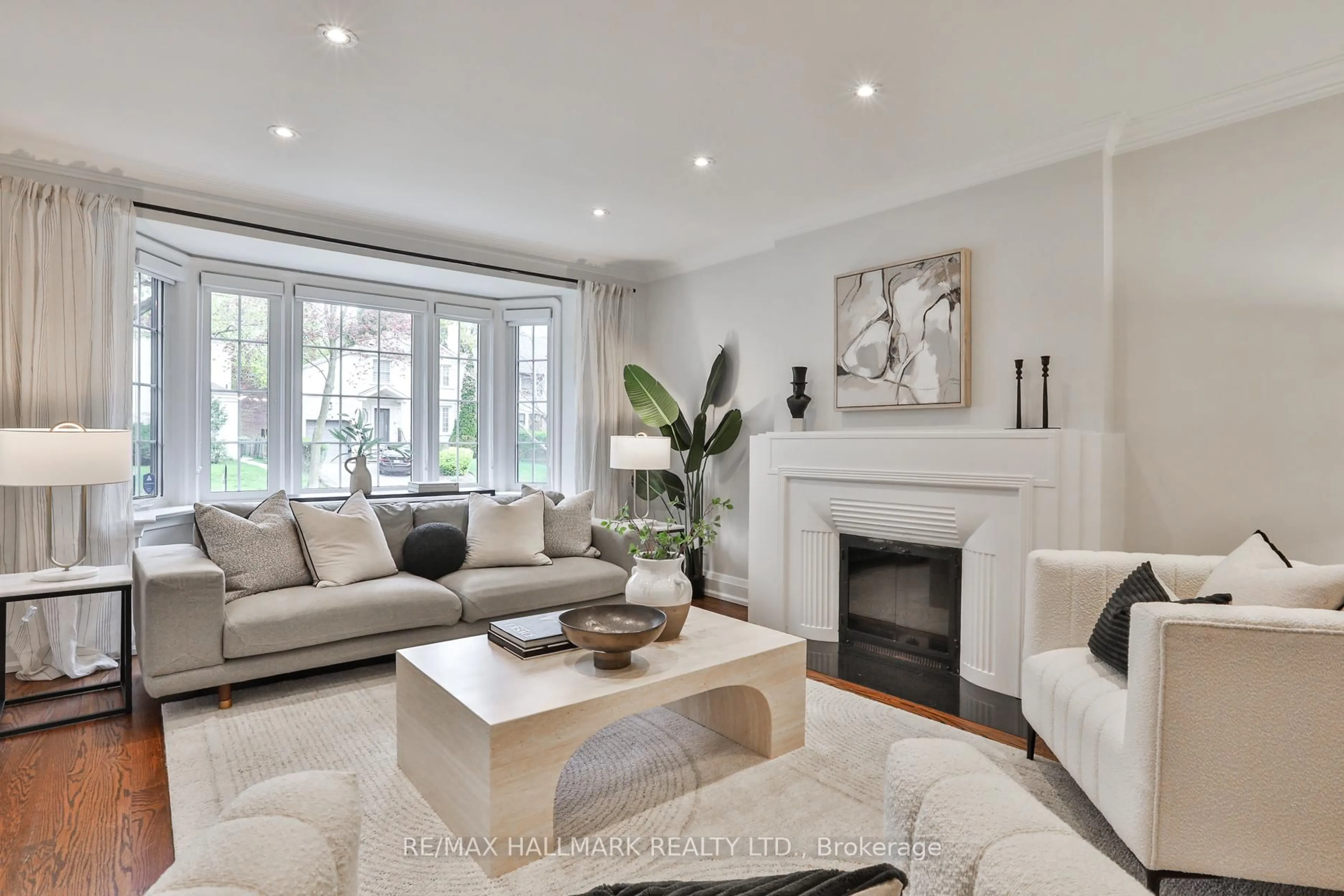 Living room with furniture, unknown for 129 Elm Ridge Dr, Toronto Ontario M6B 1A6