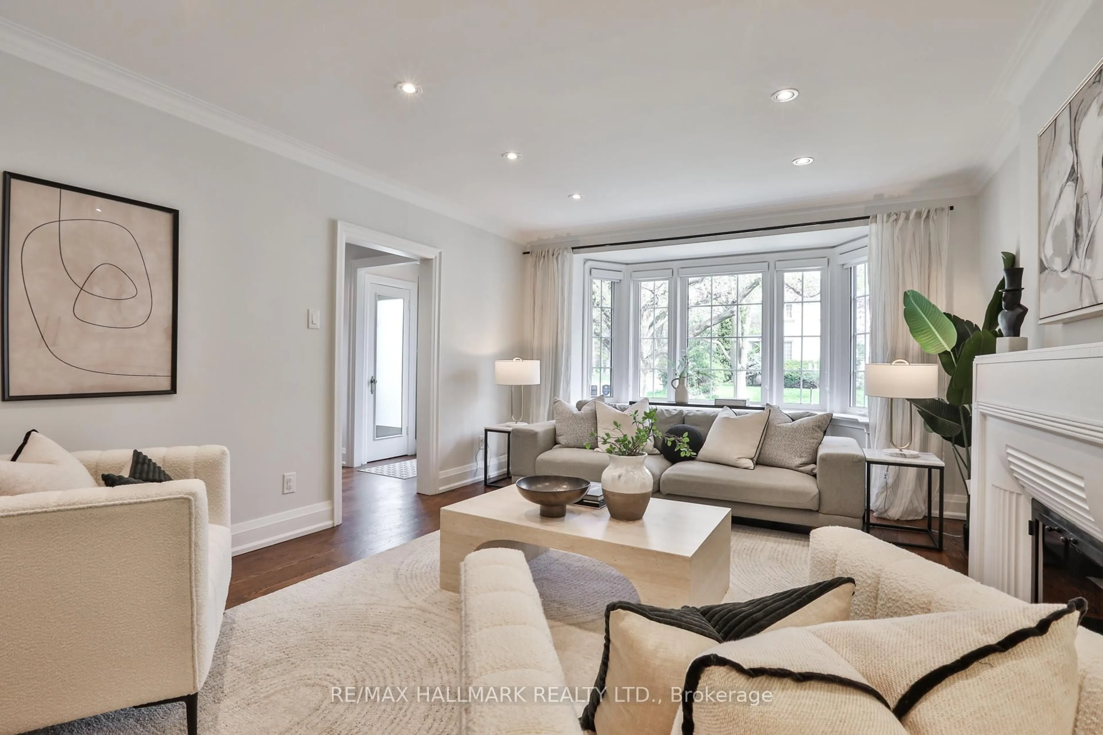 Living room with furniture, unknown for 129 Elm Ridge Dr, Toronto Ontario M6B 1A6