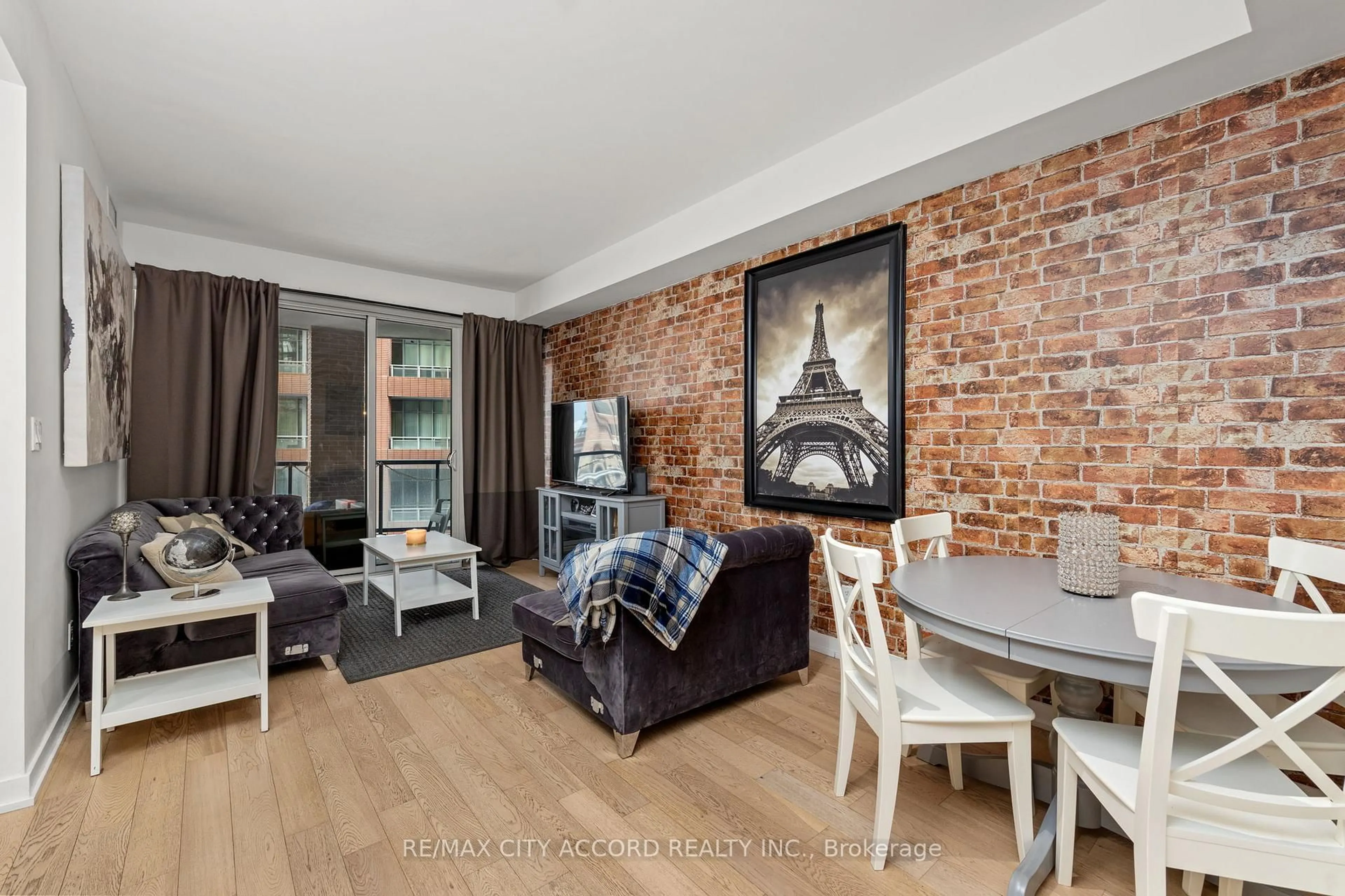 Living room with furniture, unknown for 20 Bruyeres Mews #311, Toronto Ontario M5V 0G8