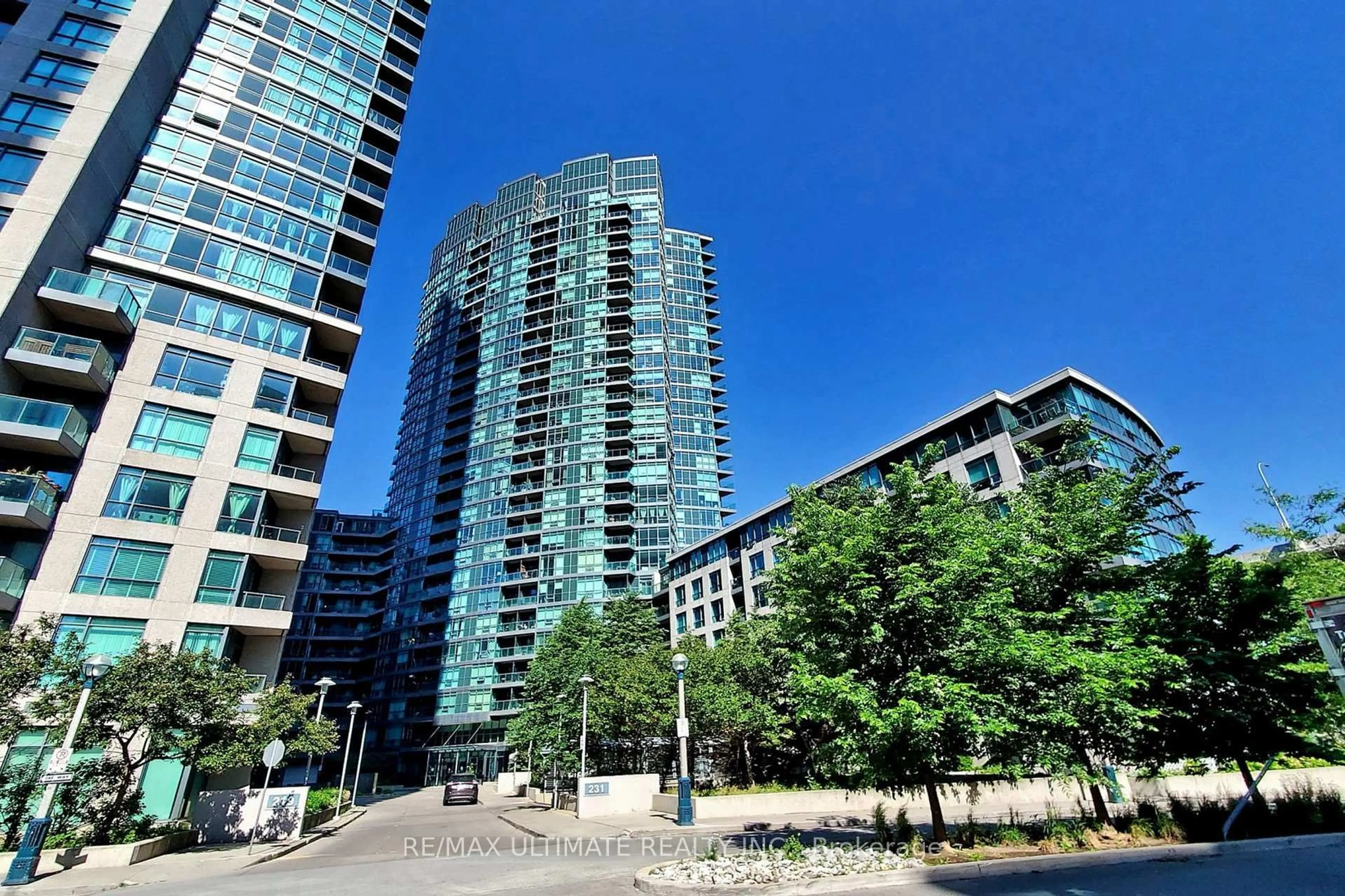 Patio, city buildings view from balcony for 231 Fort York Blvd #228, Toronto Ontario M5V 1B1