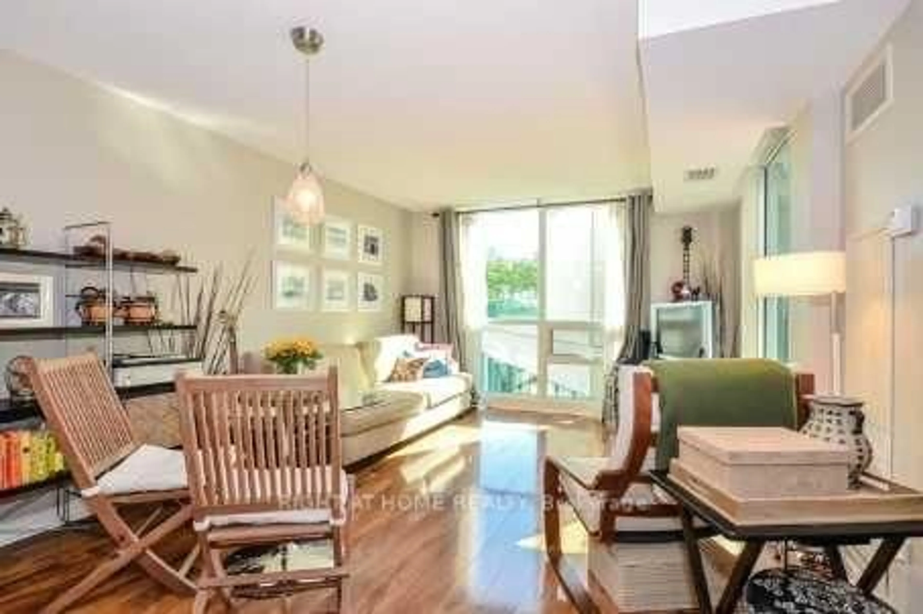 Living room with furniture, wood/laminate floor for 12 Yonge St #503, Toronto Ontario M5E 1Z9