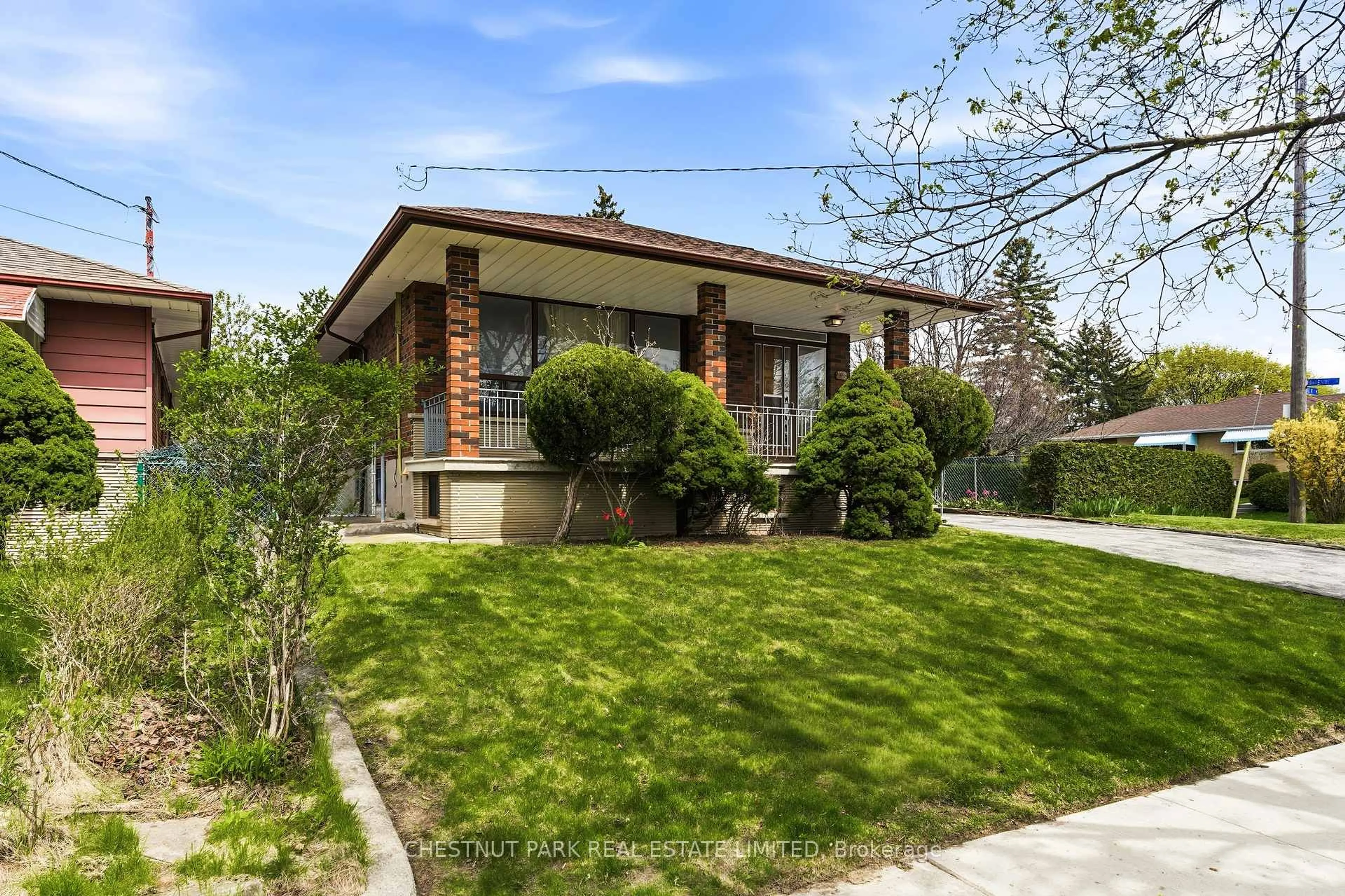 Home with brick exterior material, street for 154 Sweeney Dr, Toronto Ontario M4A 1V2