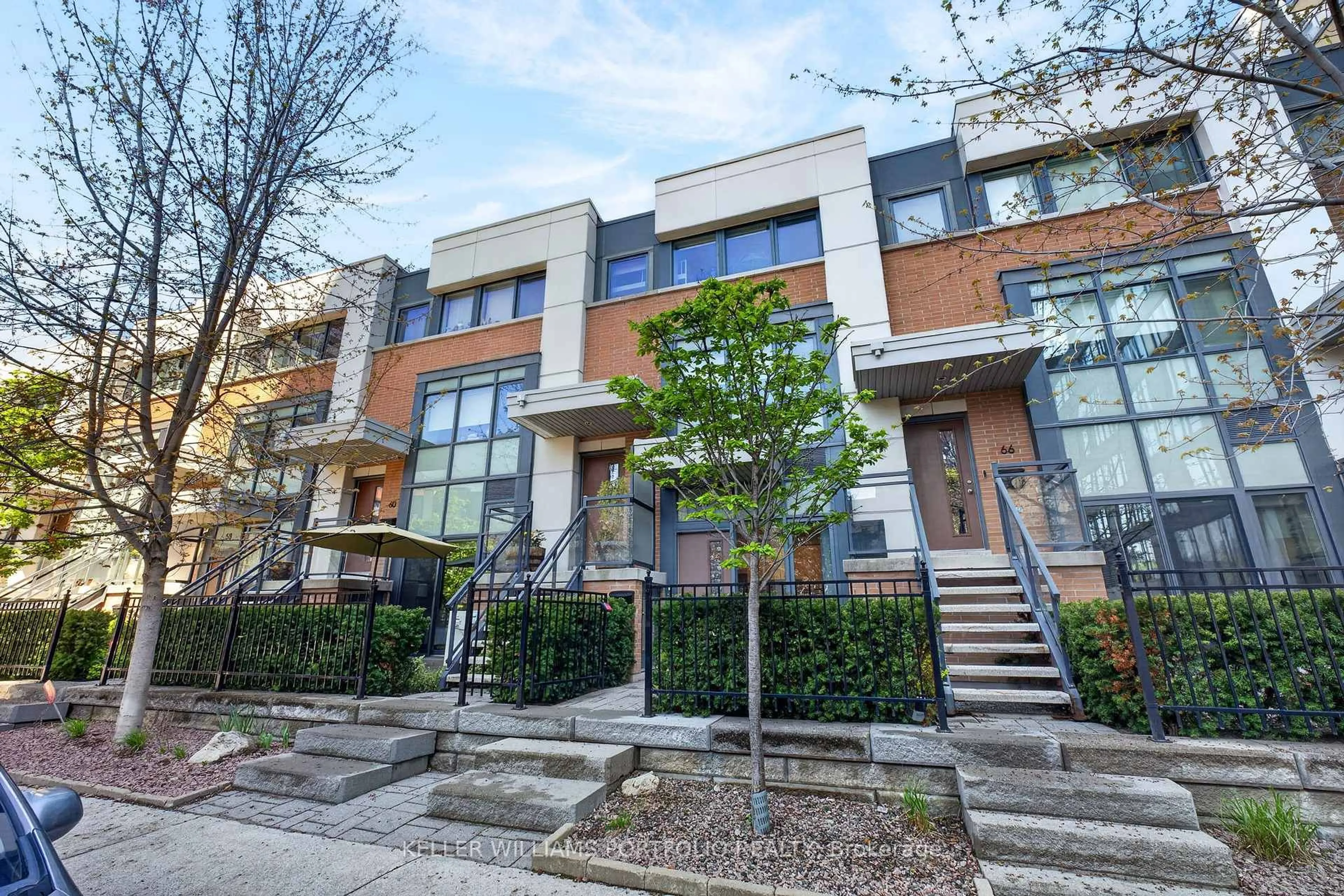 Home with brick exterior material, street for 64 Cole St, Toronto Ontario M5A 0A8