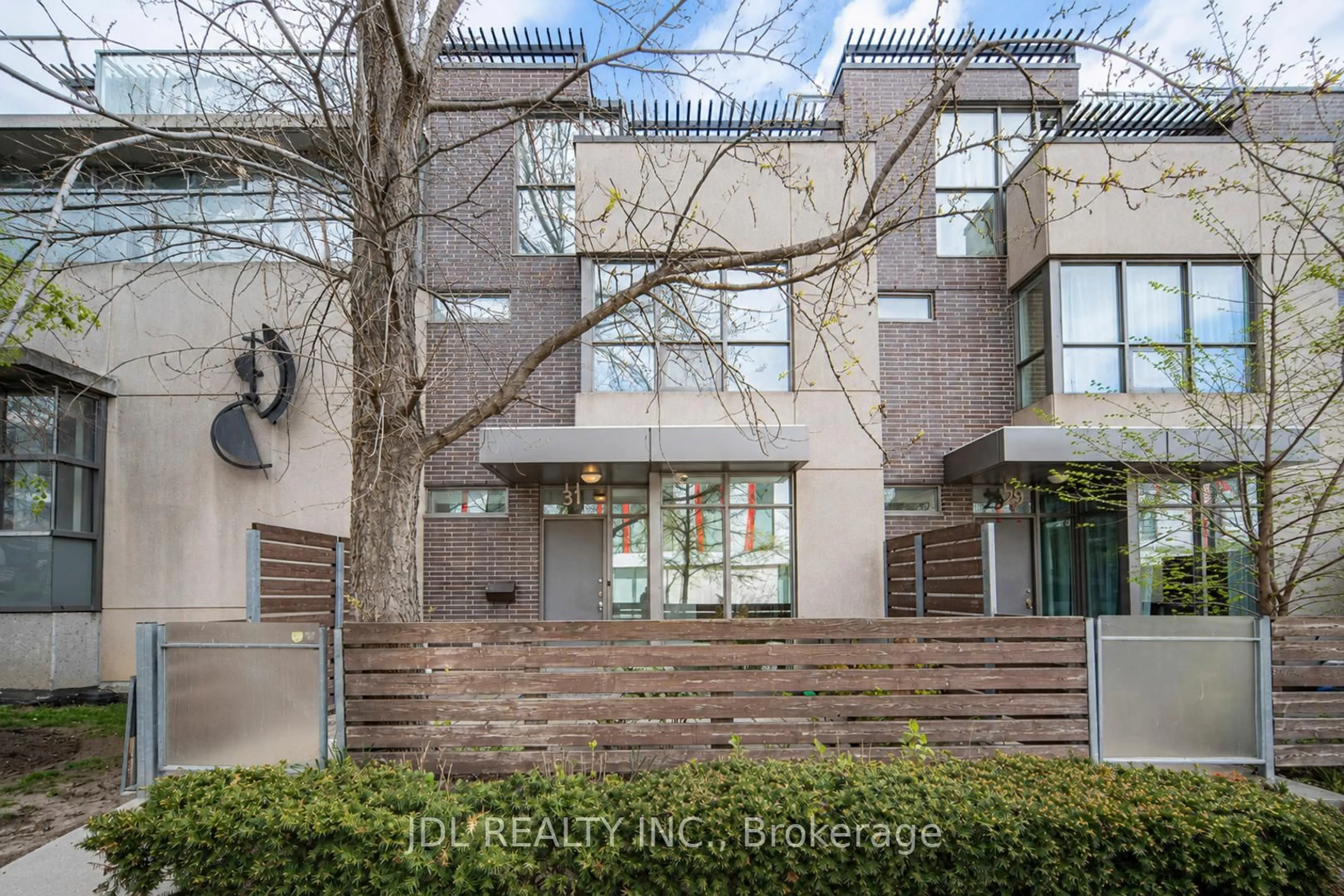 Home with brick exterior material, street for 31 Brunel Crt #Th8, Toronto Ontario M5V 3Y2