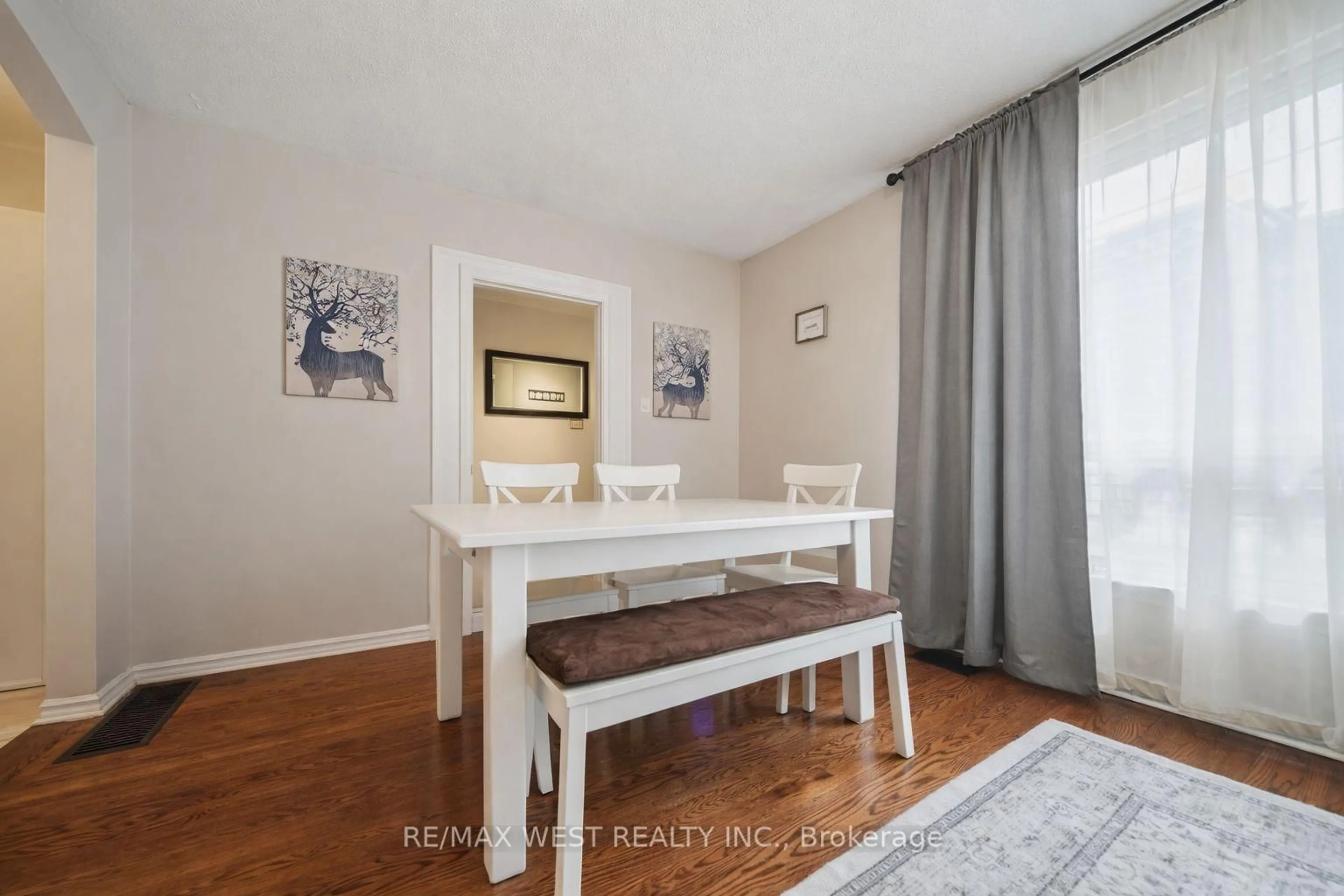 Dining room, wood/laminate floor for 2 Lisburn Cres, Toronto Ontario M2J 2Z5