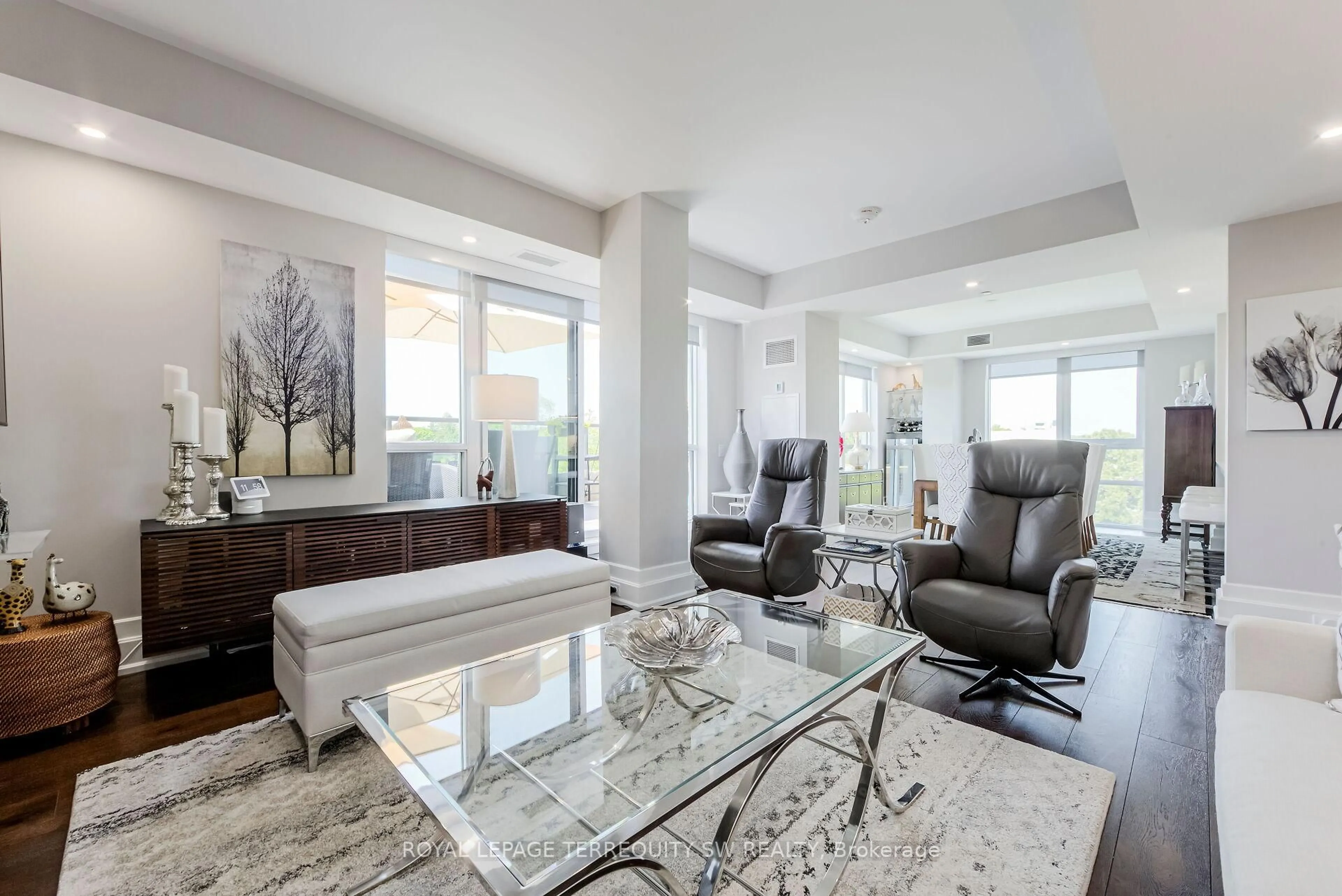 Living room with furniture, ceramic/tile floor for 3 Southvale Dr #605, Toronto Ontario M4G 1G1