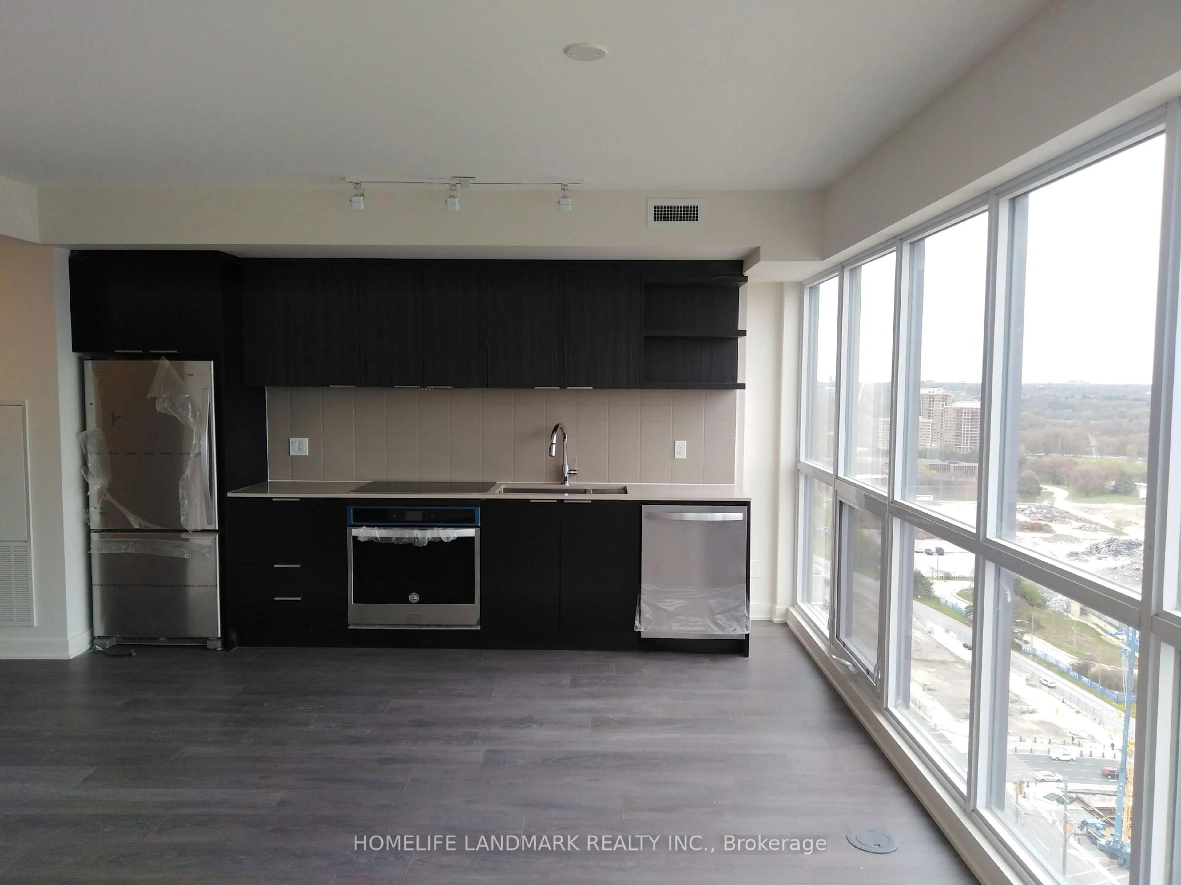 Open concept kitchen, unknown for 6 Sonic Way #2604, Toronto Ontario M3C 0P1