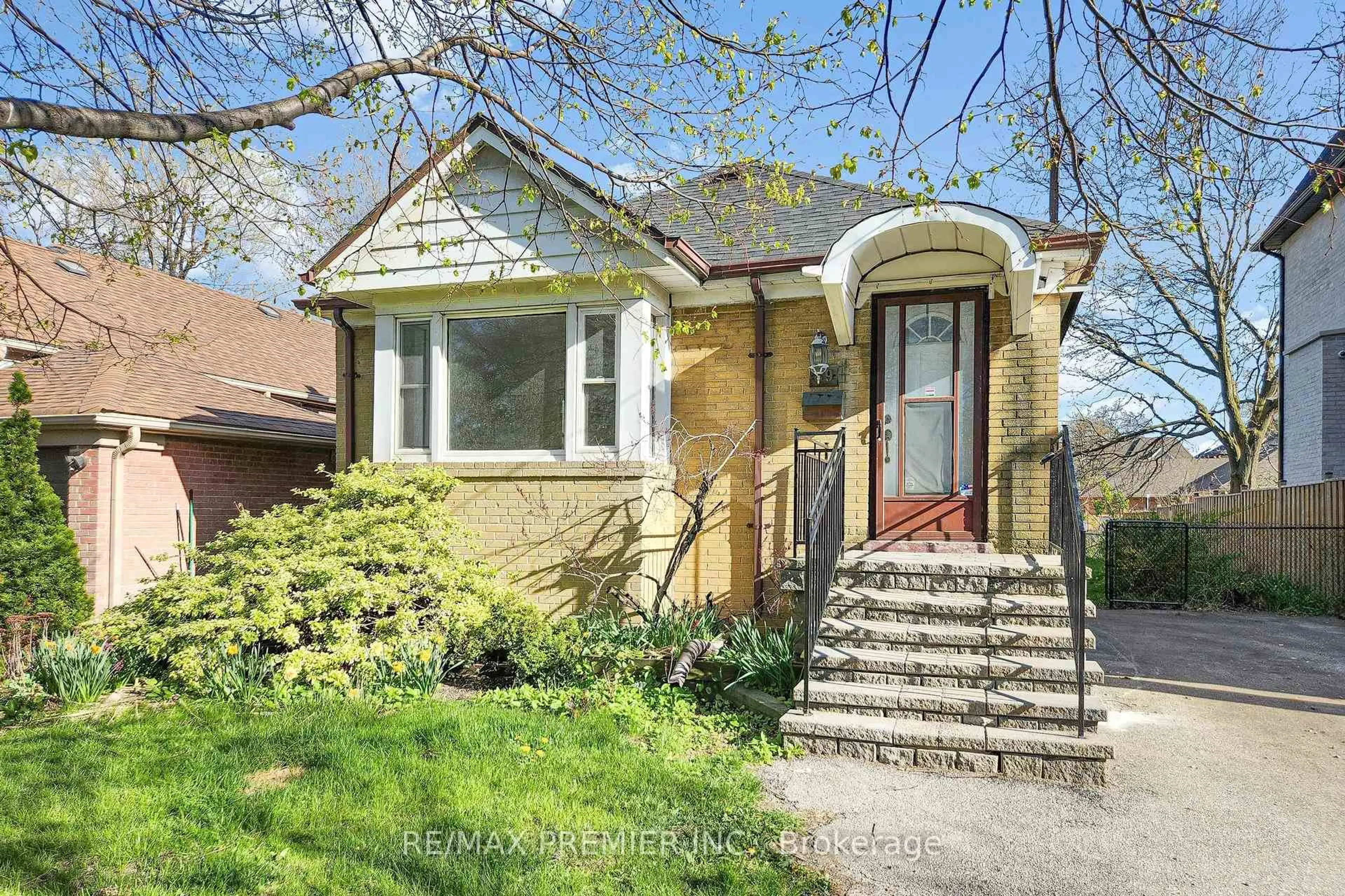 Home with brick exterior material, street for 89 Burncrest Dr, Toronto Ontario M5M 2Z6
