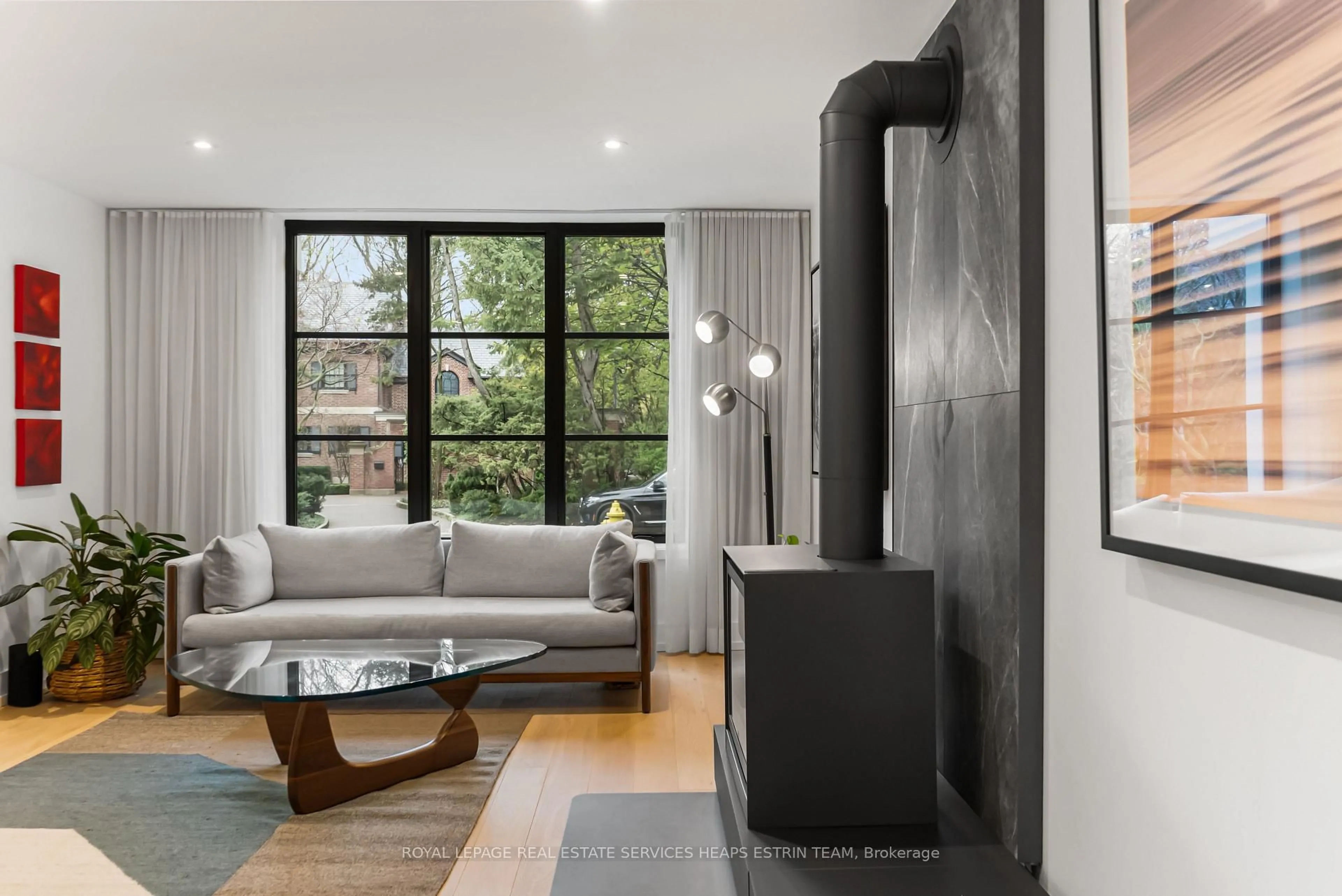 Living room with furniture, cement floor for 1 Moorehill Dr, Toronto Ontario M4G 1A2