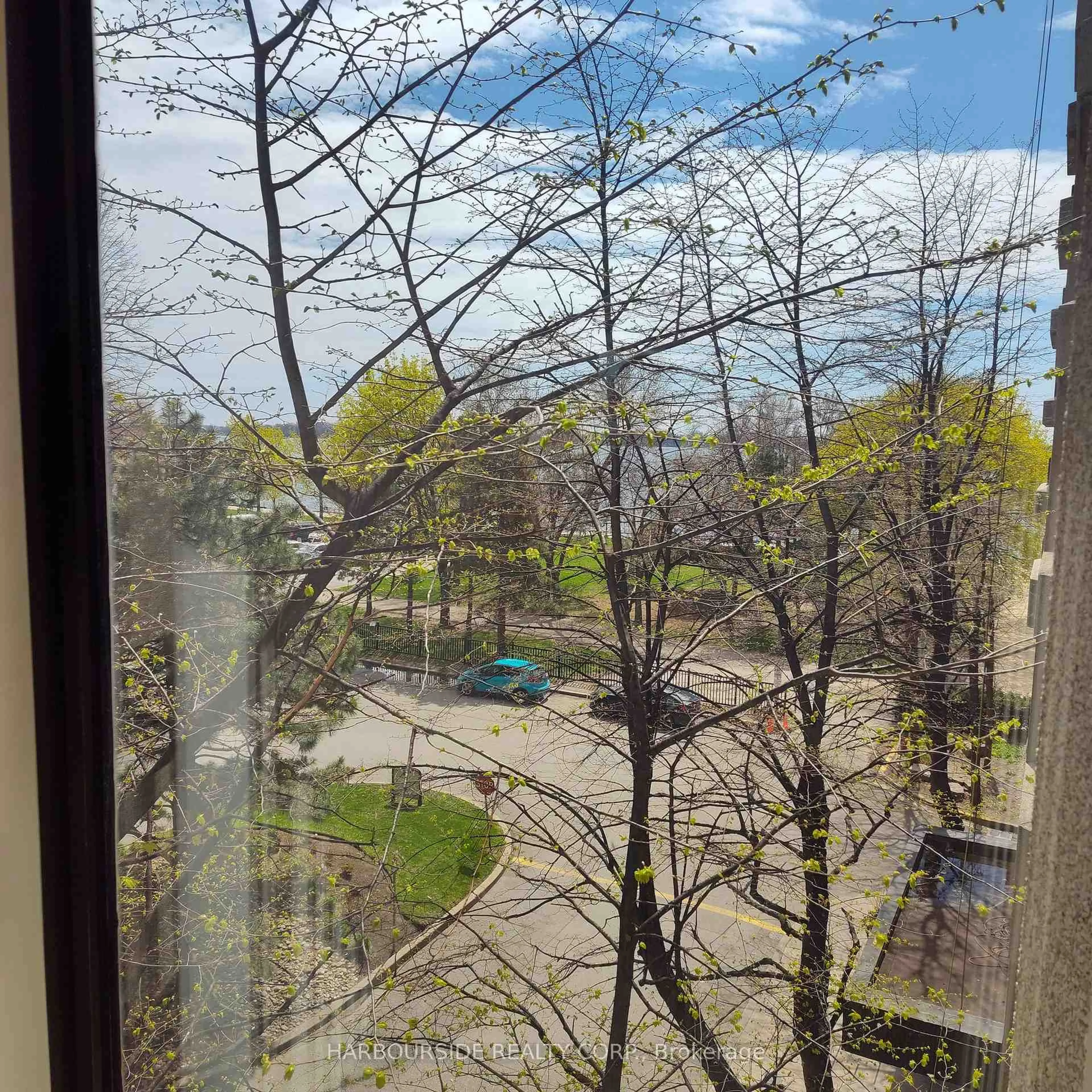 Balcony in the apartment, city buildings view from balcony for 65 Harbour Sq #405, Toronto Ontario M5J 2L4
